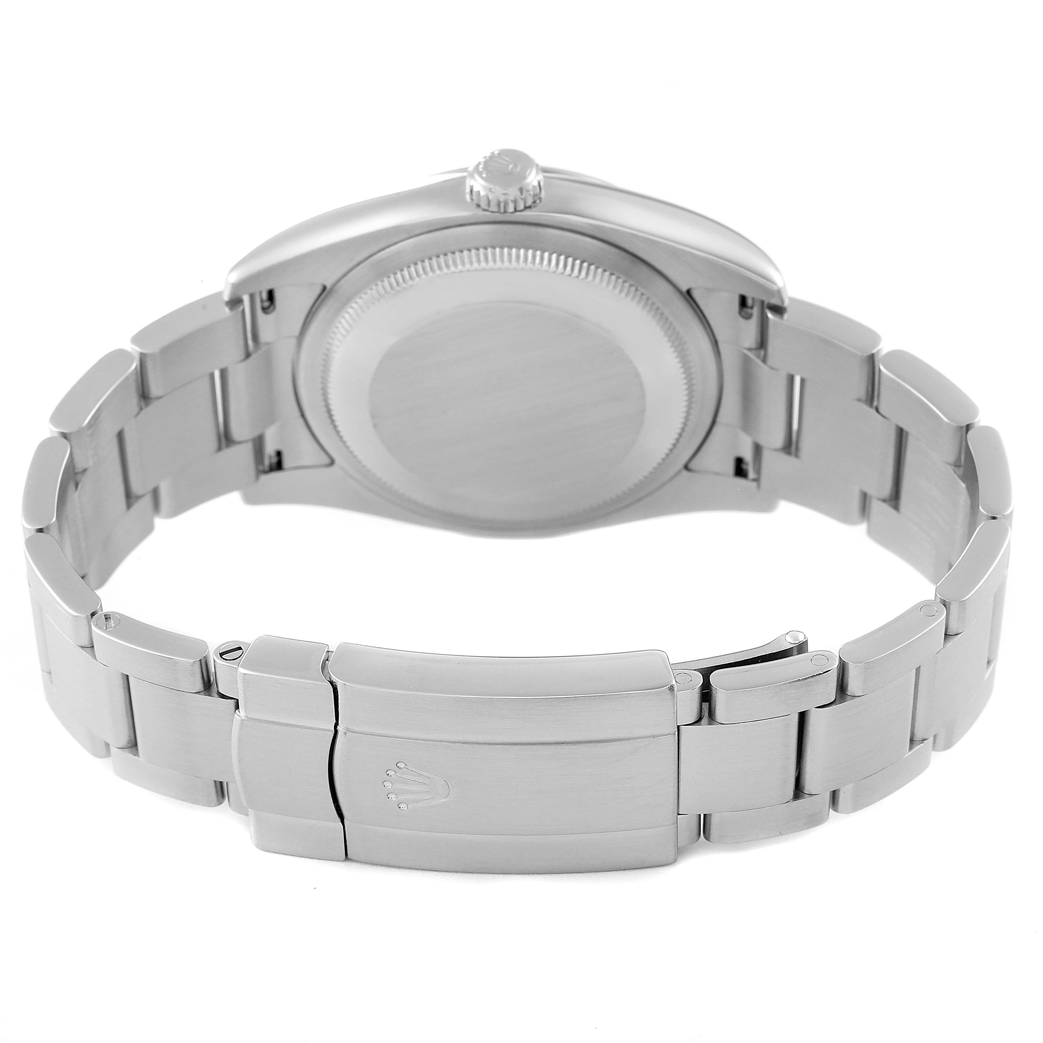 The image shows the back view of a Rolex Oyster Perpetual 116000 Men's Stainless Steel Blue Dial 116000 Men's Stainless Steel Blue Dial watch, focusing on the case, bracelet, and clasp.