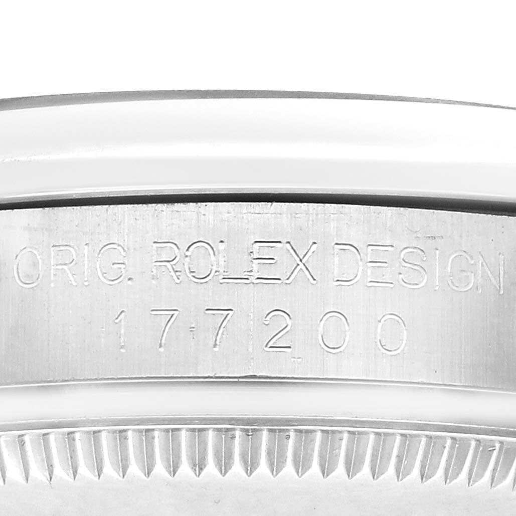 The image shows the side of a Rolex Mid-Size 177200 Women
s Stainless Steel Grey Dial model with the "ORIG. ROLEX DESIGN" inscription and model number 177200.