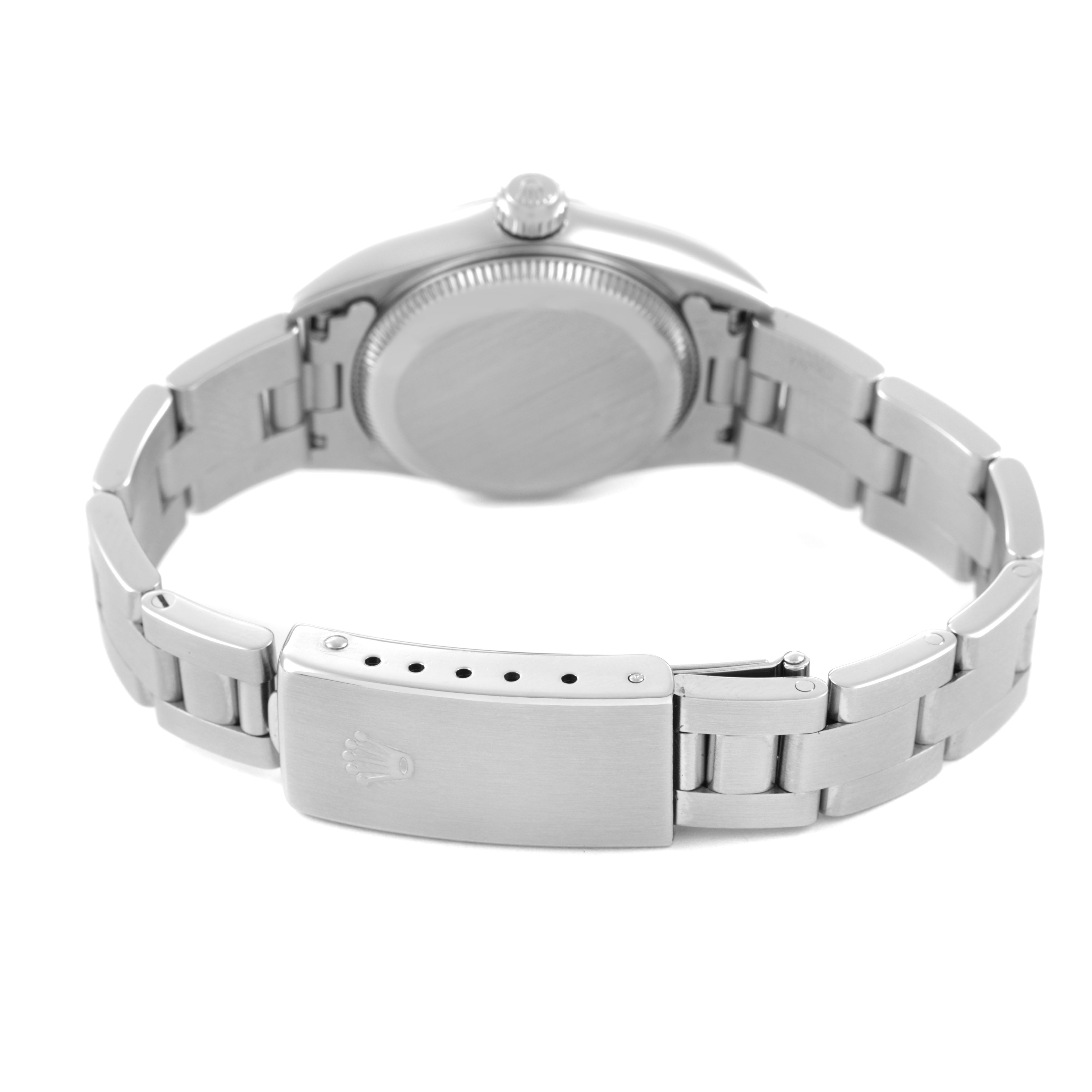 The image shows the Rolex Oyster Perpetual 76080 Women's Stainless Steel Black Dial watch from the back, featuring its clasp, bracelet, and case back.