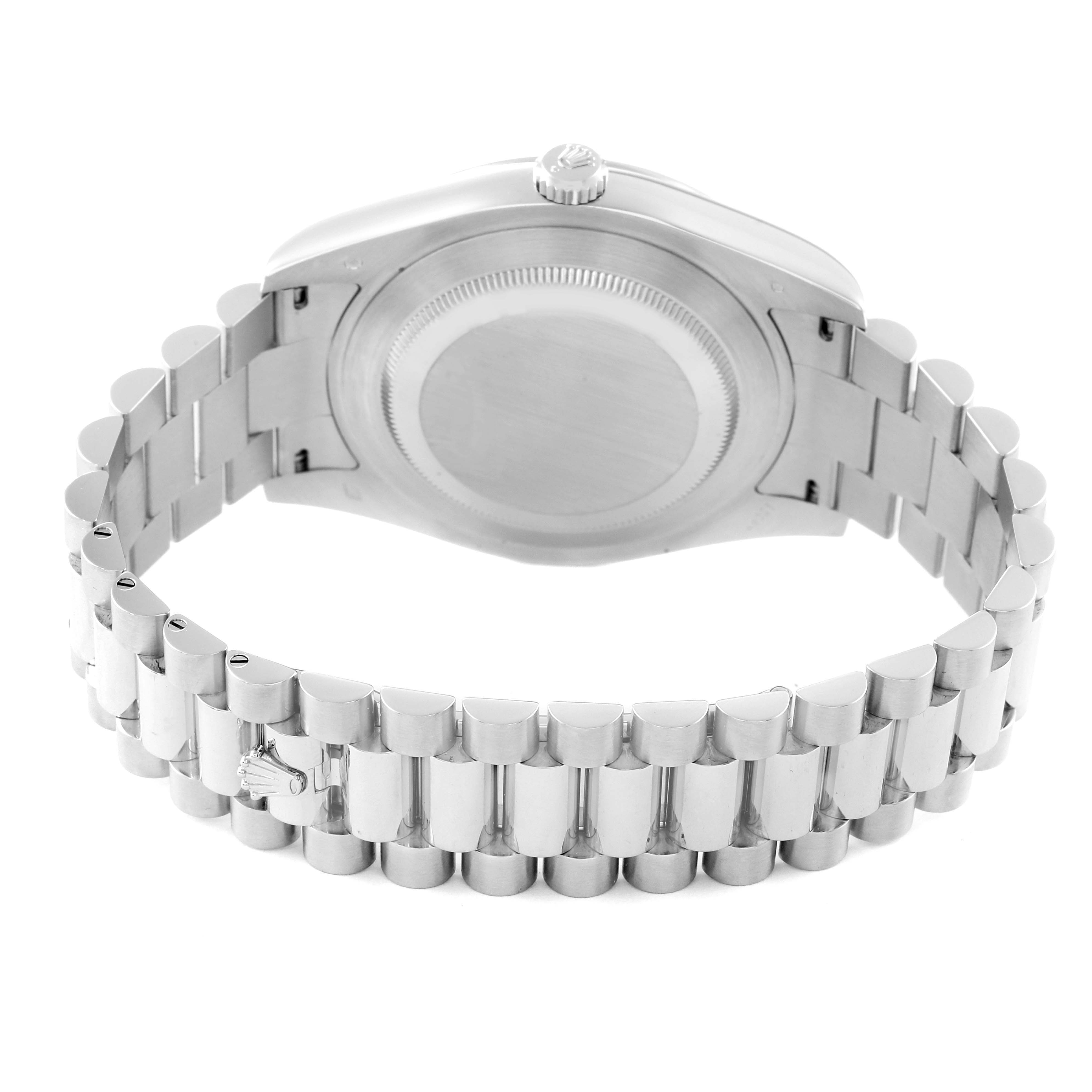 The image shows the bottom view of a Rolex President 218206 Men's Platinum Blue Dial 218206 Men's Platinum Blue Dial model watch, highlighting the case back and bracelet.