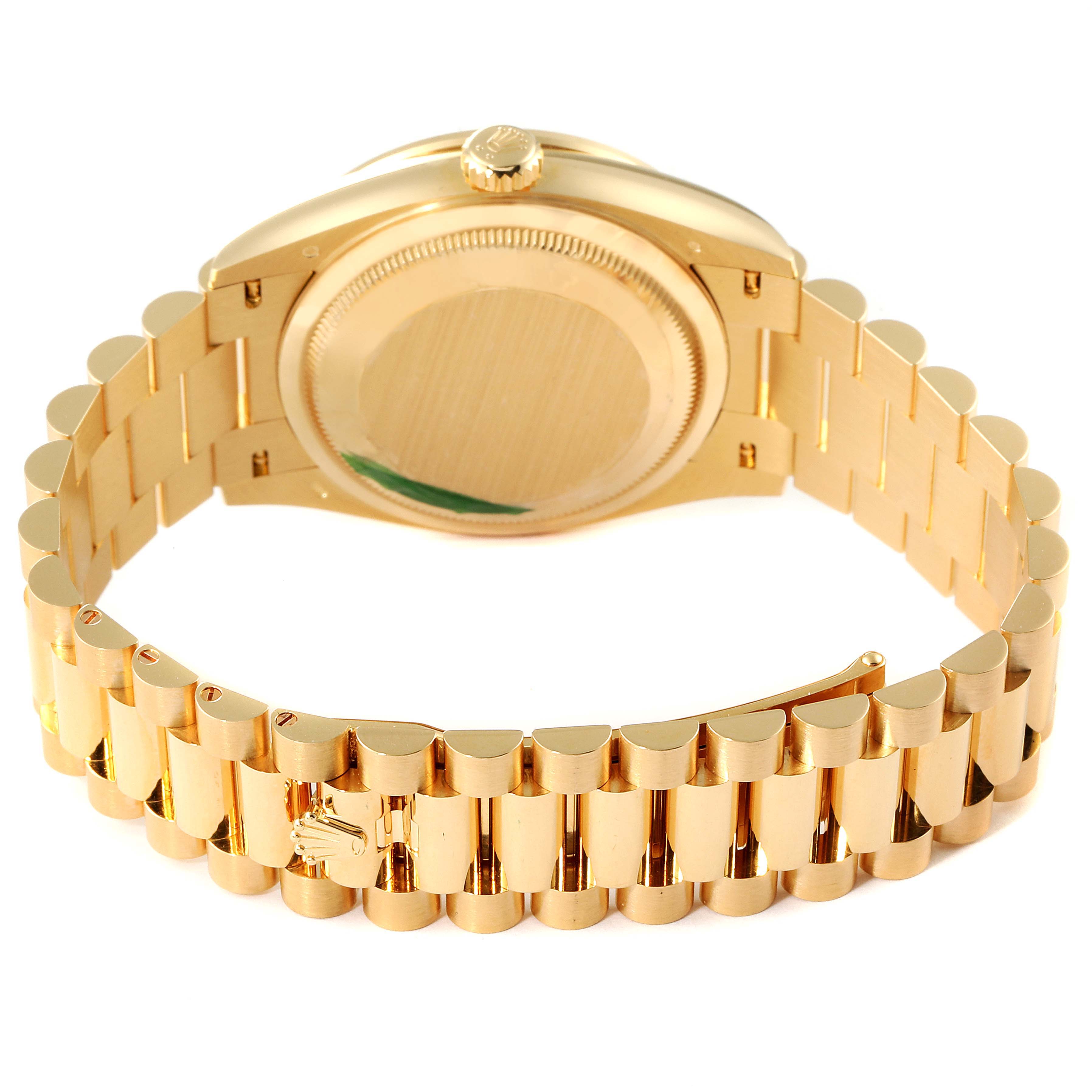 This image shows the back view of the Rolex President 128348 Men
s Yellow Gold Grey Dial 128348 Men
s Yellow Gold Grey Dial model watch, highlighting its gold case and bracelet.