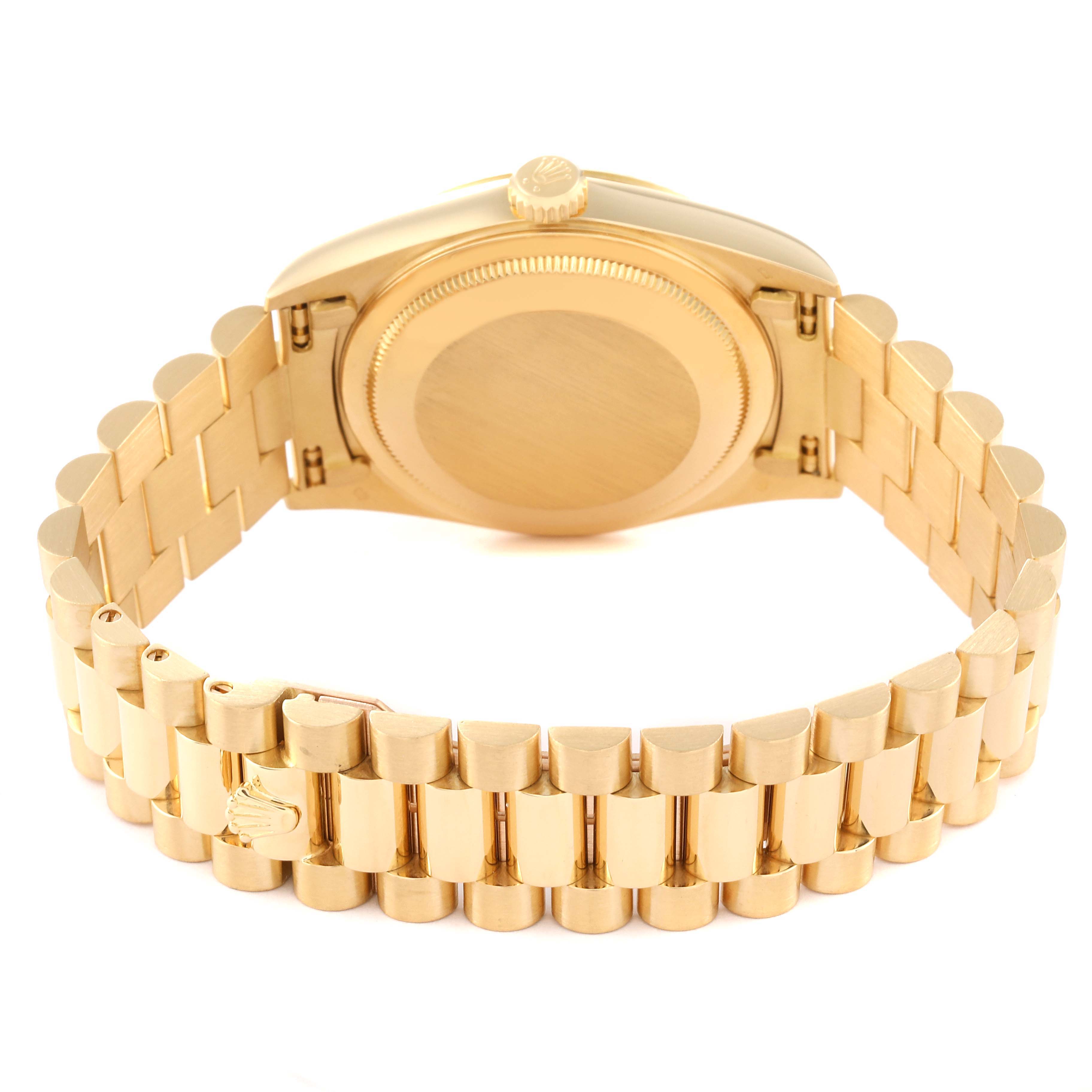 The image shows the rear view of a Rolex President 18238 Men
s Yellow Gold Champagne Dial 18238 Men
s Yellow Gold Champagne Dial model watch, highlighting its gold bracelet and closed case back.