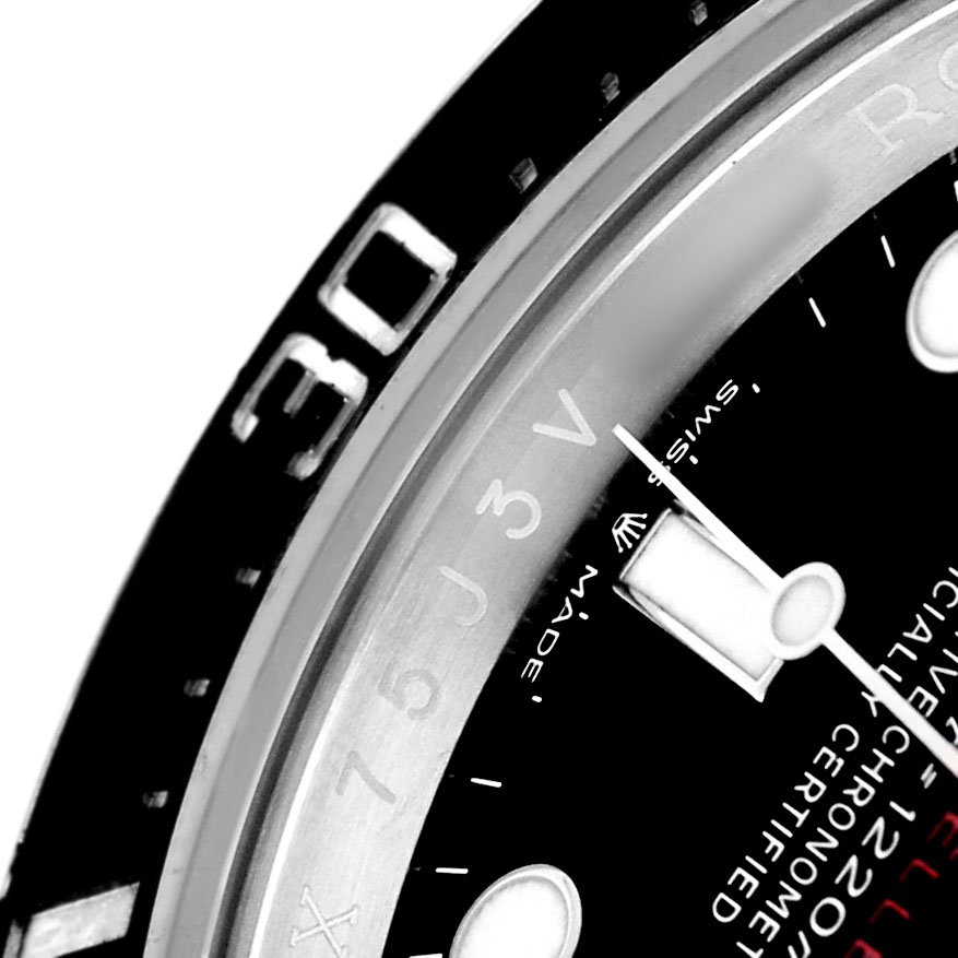 The image shows a close-up of the Rolex Sea-Dweller 126600 Men's Stainless Steel Black Dial's bezel, dial, and part of a hand.