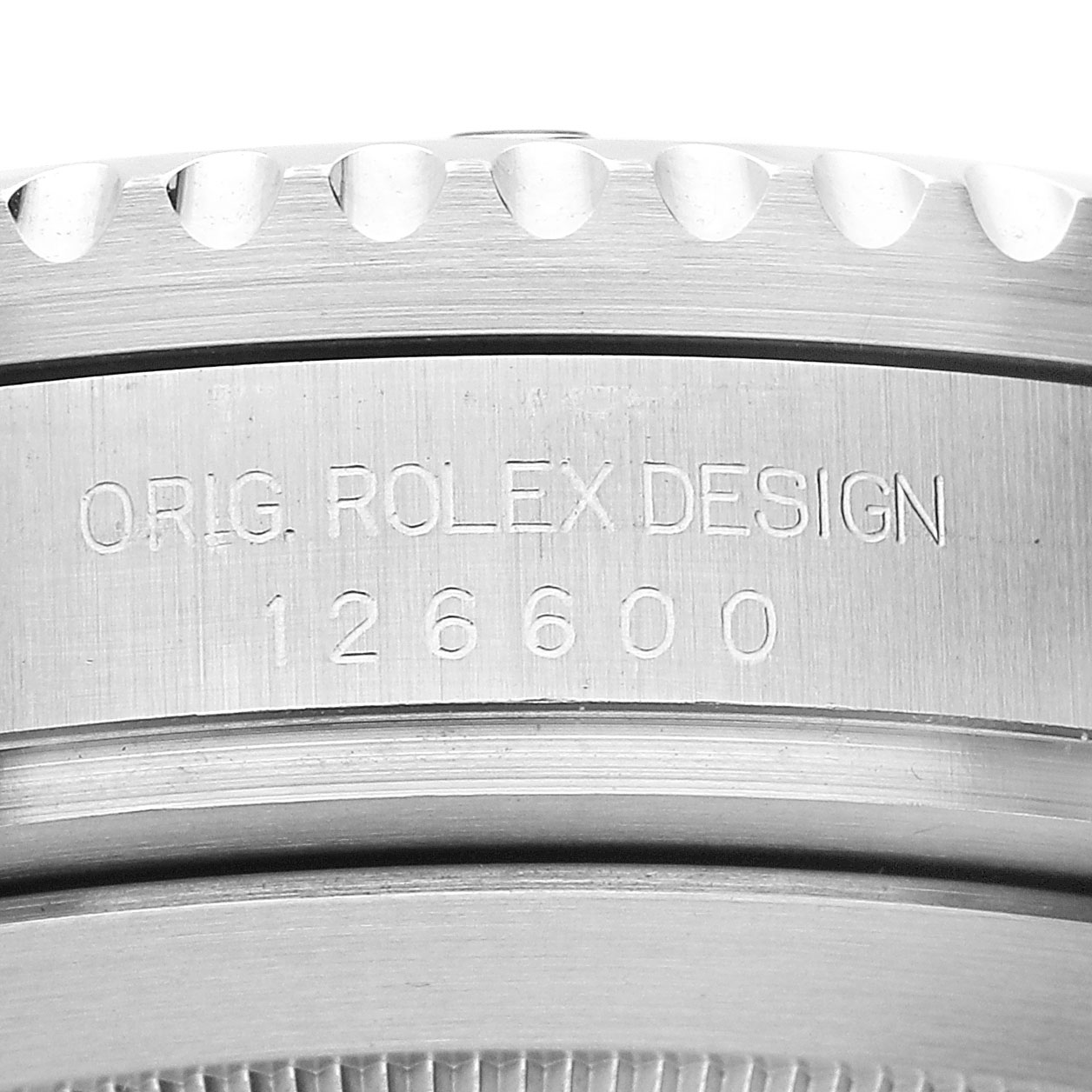 The image shows an angled close-up of the bezel and side engraving on the Rolex Sea-Dweller 126600 Men's Stainless Steel Black Dial, highlighting the model number.