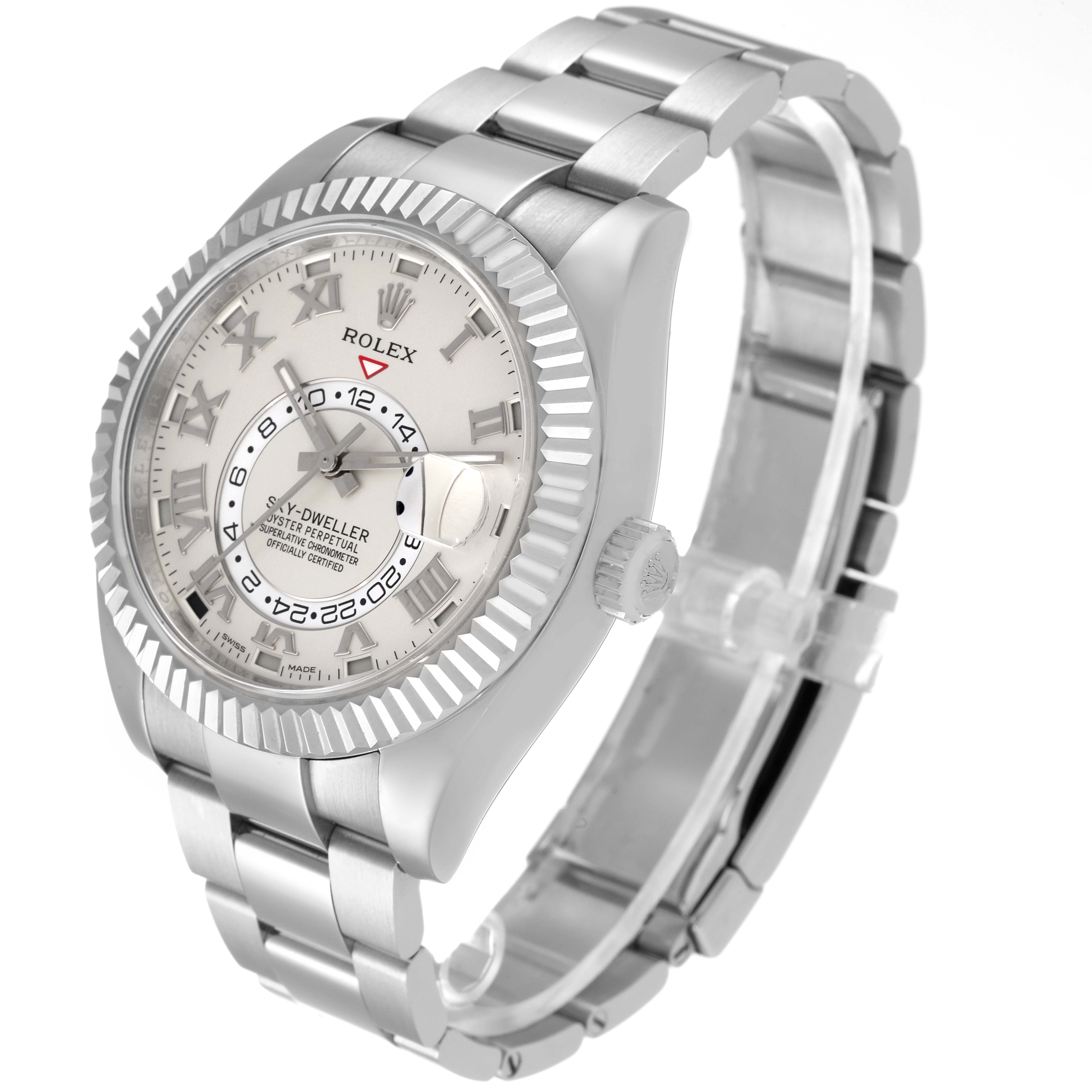 The Rolex Sky-Dweller 326939 Men's White Gold White Dial 326939 Men's White Gold White Dial watch is shown at a three-quarter angle, displaying the case, dial, bracelet, and crown.