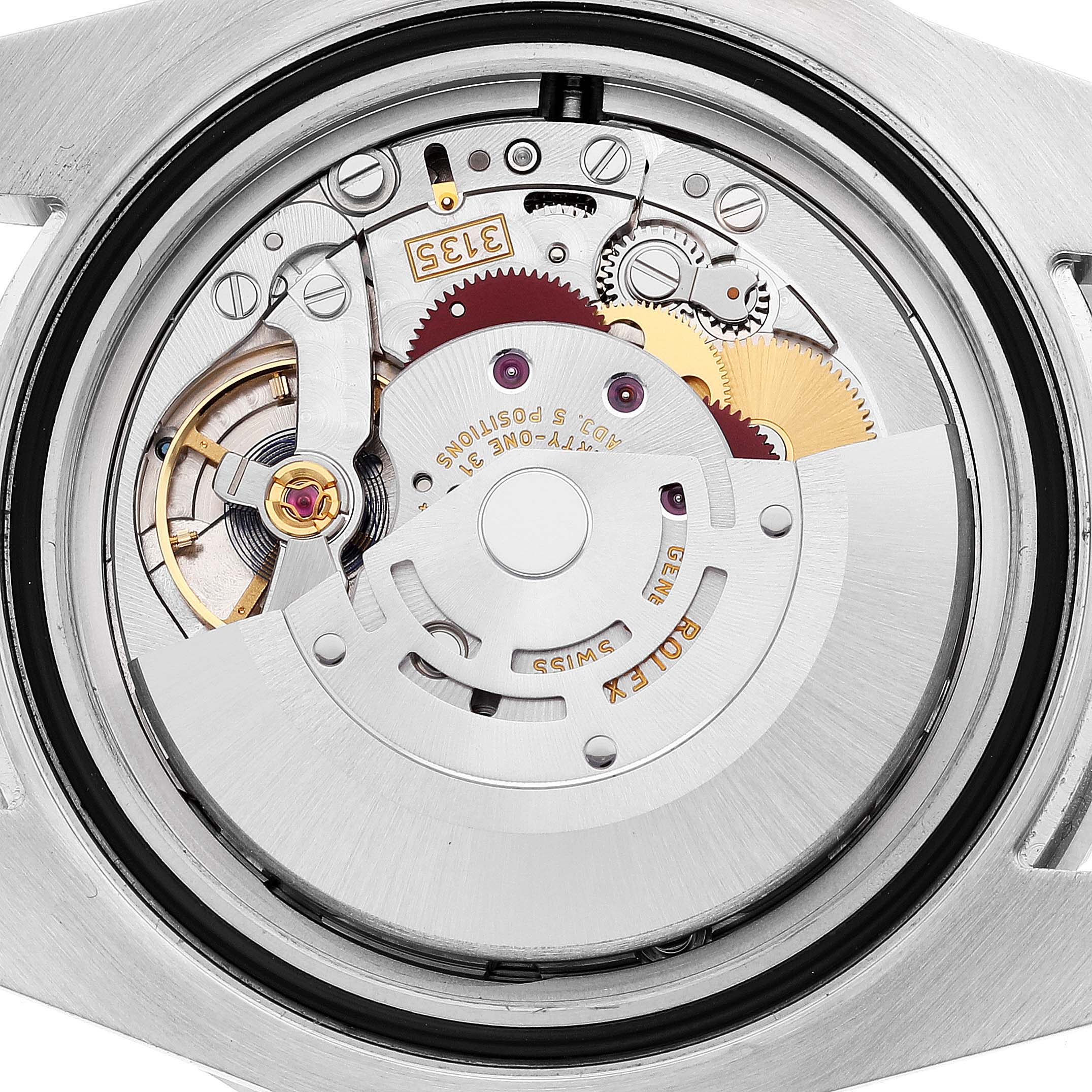 This image shows the back view of the Rolex Submariner 116610 Men's Stainless Steel Black Dial 116610 Men's Stainless Steel Black Dial watch, focusing on its intricate movement and internal mechanical components.