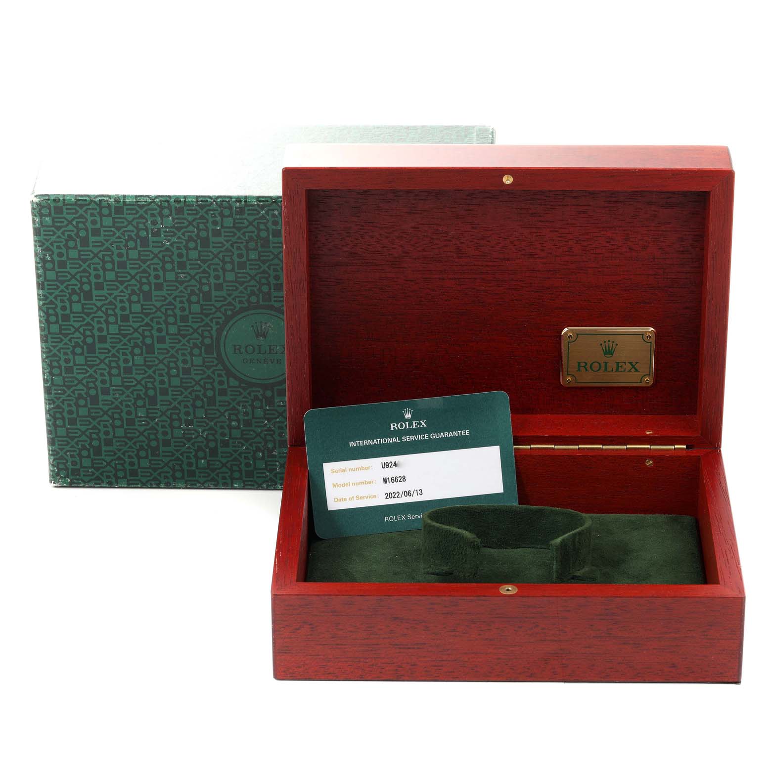 The image shows an open Rolex Yacht-Master 16628 Men
s Yellow Gold White Dial 16628 Men
s Yellow Gold White Dial watch box with a green international service guarantee card inside.