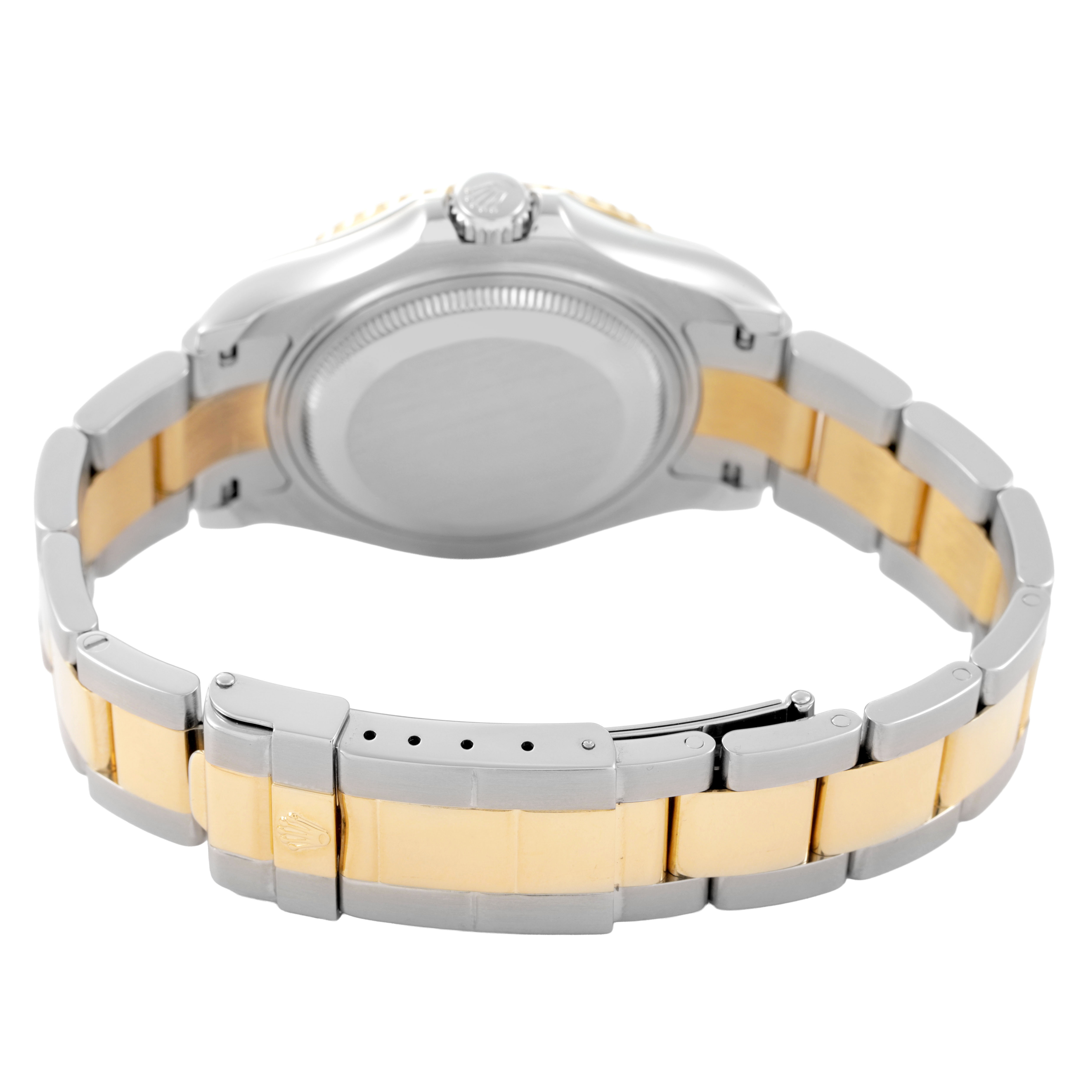 The image shows the back and bracelet of the Rolex Yacht-Master 168623 Men's Steel and Gold (two tone) Blue Dial, highlighting its two-tone metal design and clasp.