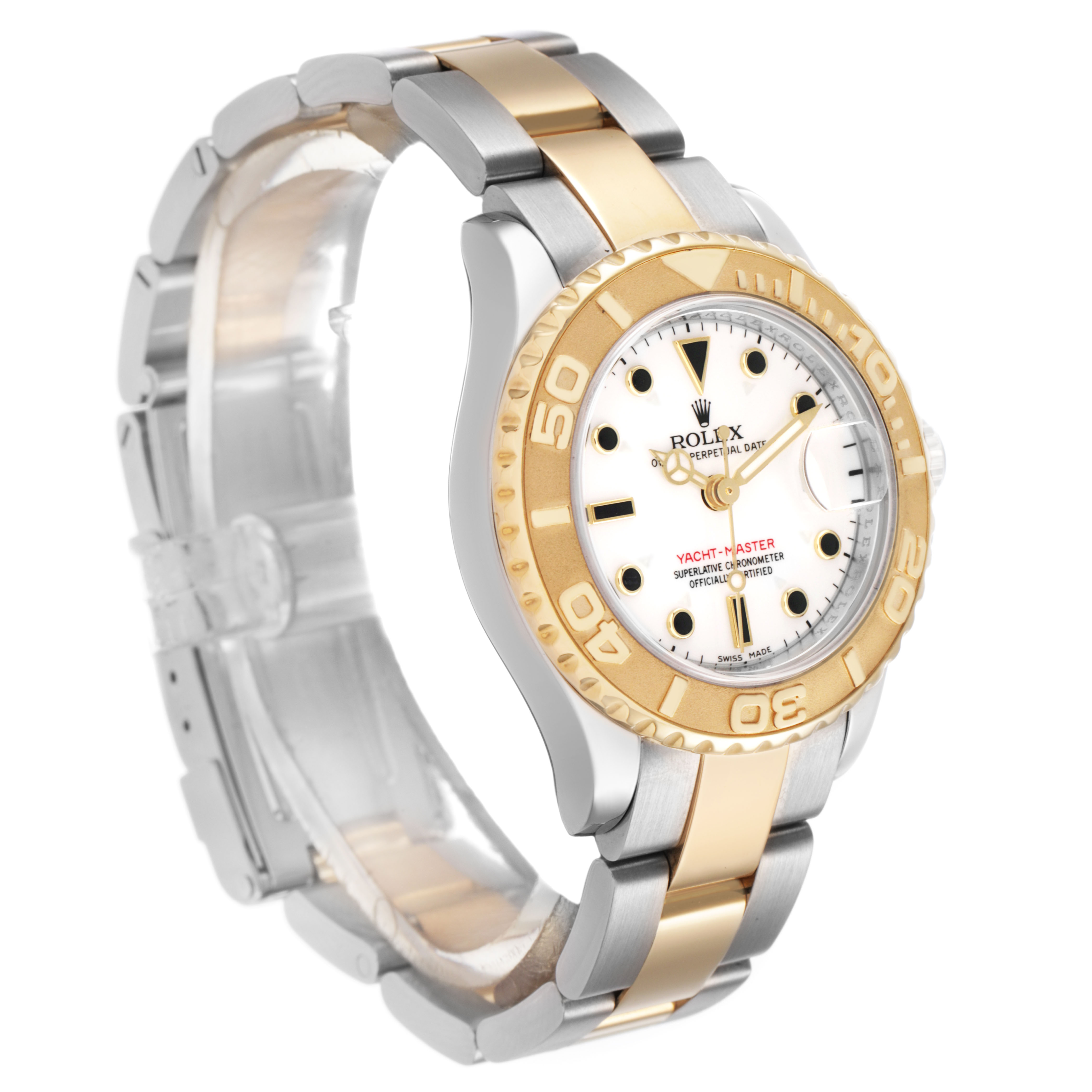 The Rolex Yacht-Master 169623 Women's Steel and Gold (two tone) White Dial watch is shown at an oblique angle, displaying the bezel, dial, and part of the bracelet.