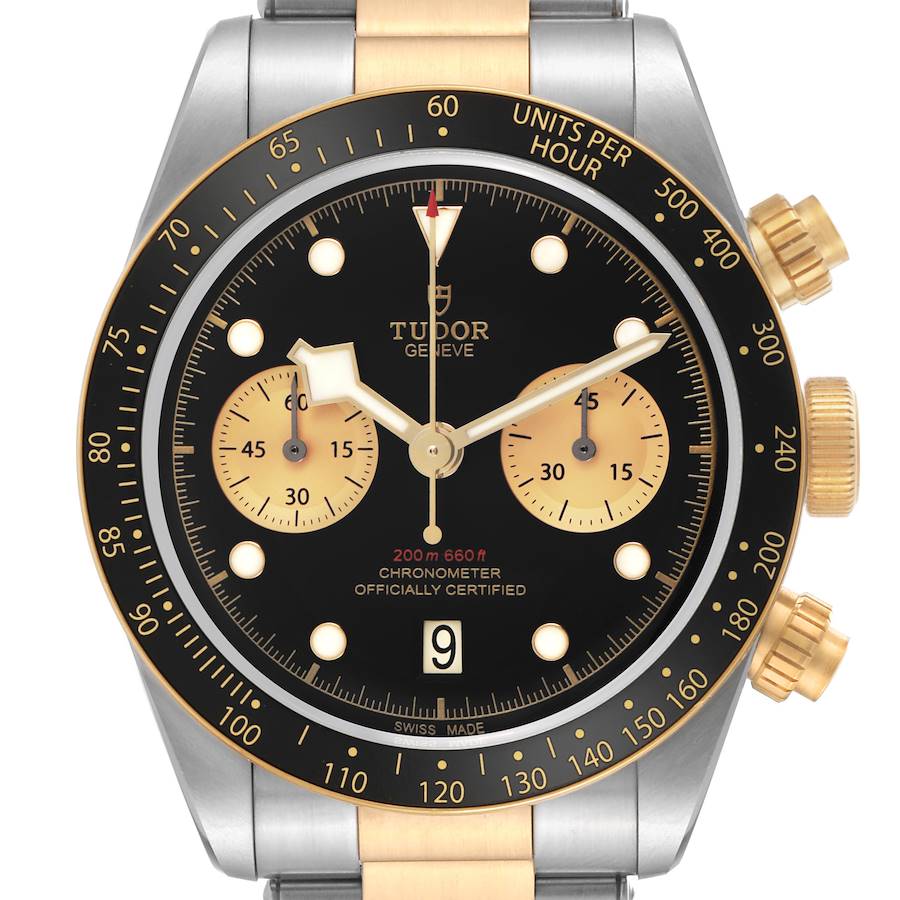The Tudor Heritage Black Bay 79363N Men's Steel and Gold (two tone) Black Dial watch is shown from the front, highlighting the dial, bezel, and pushers.