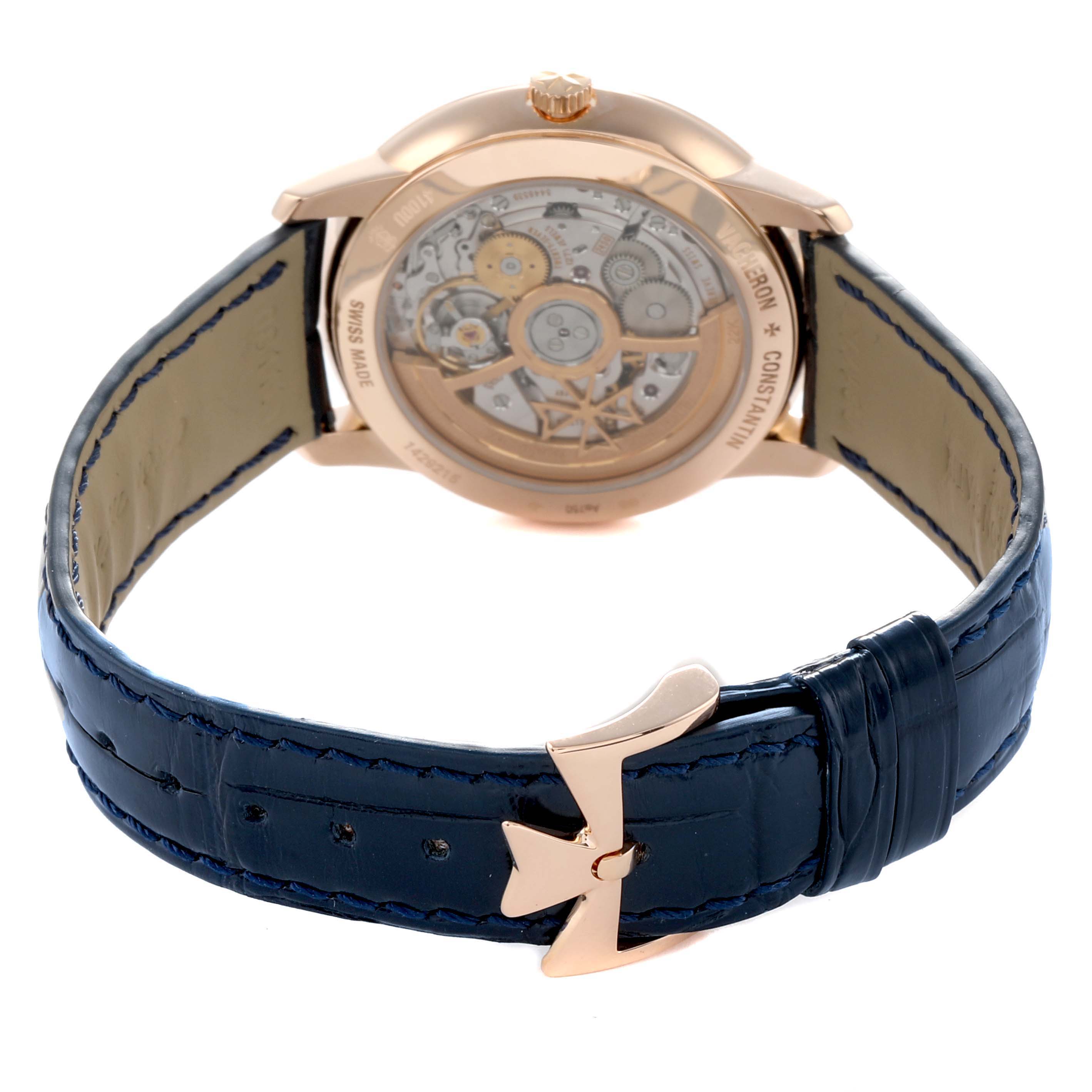 The image shows the rear view of a Vacheron Constantin Patrimony 4100U Men
s Rose Gold Blue Dial, highlighting its movement and blue leather strap.
