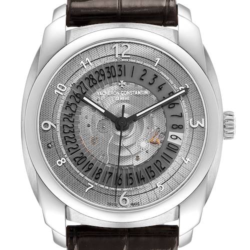 The Vacheron Constantin Quai de L'Ile watch is shown from the front, displaying its detailed dial and silver case.