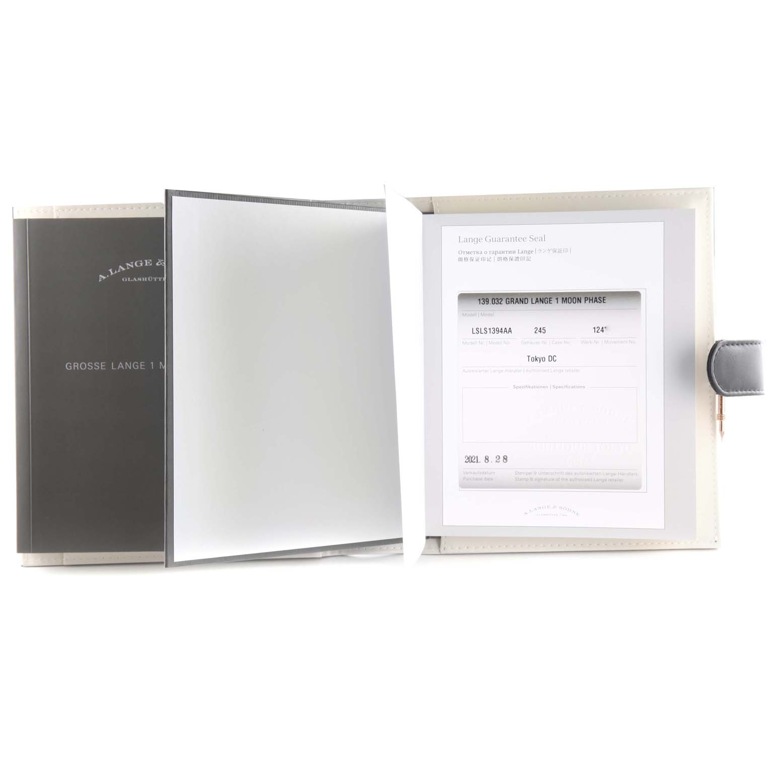 The image shows a warranty booklet and certificate for the A. Lange & Sohne Lange 1 watch model.