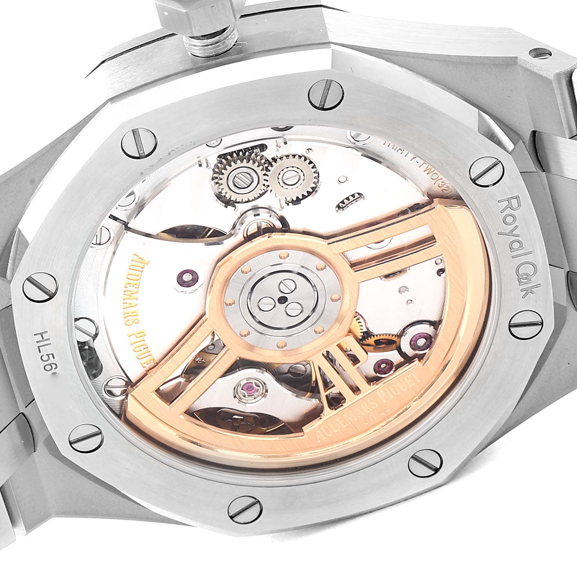 This image shows the back case of a Royal Oak watch by Audemars Piguet, revealing its detailed mechanical movement.