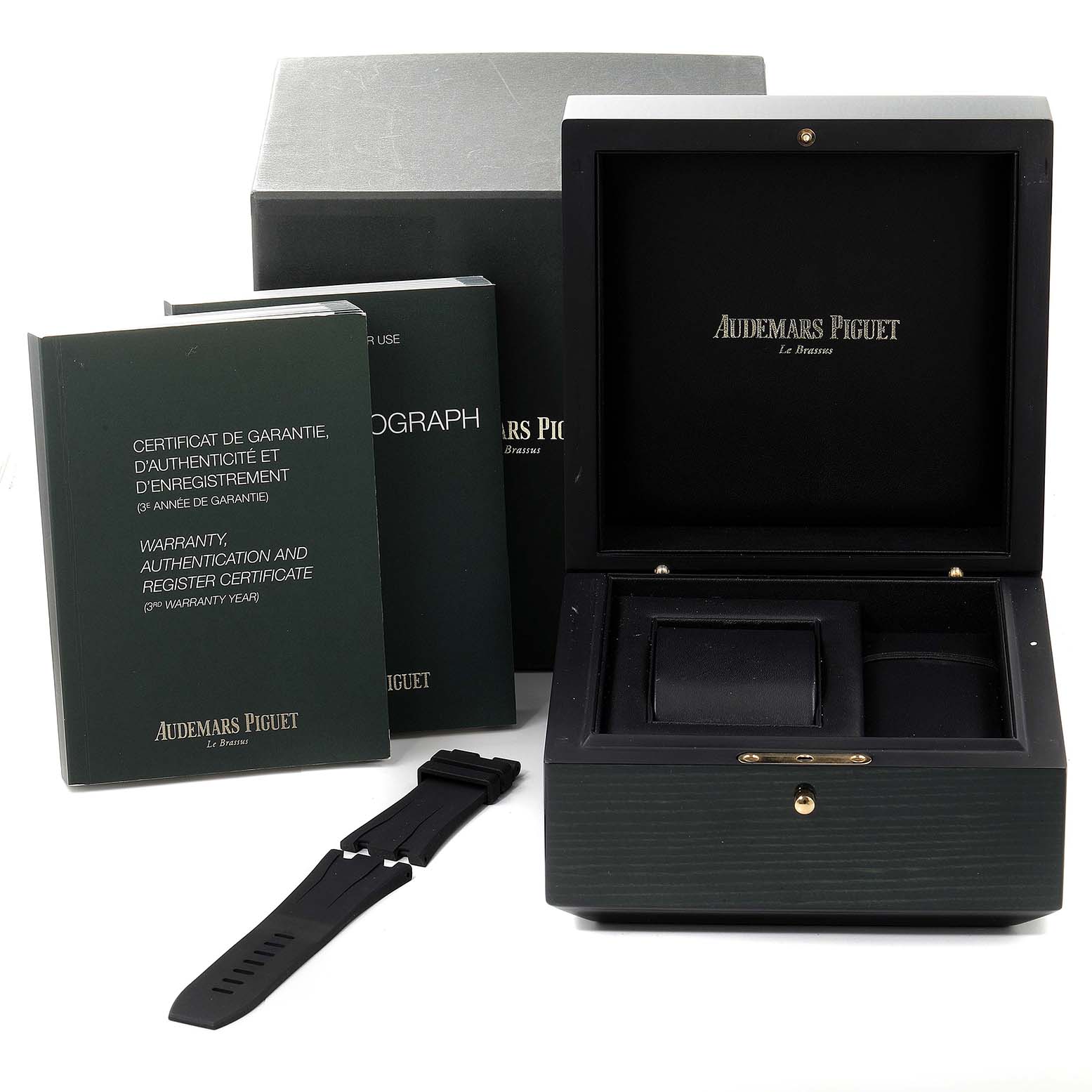 The image shows the packaging, box, extra strap, and documentation for the Audemars Piguet Royal Oak Offshore 26401PO.OO.A018CR.01 Men's Platinum Blue Dial 26401PO.OO.A018CR.01 Men's Platinum Blue Dial watch.