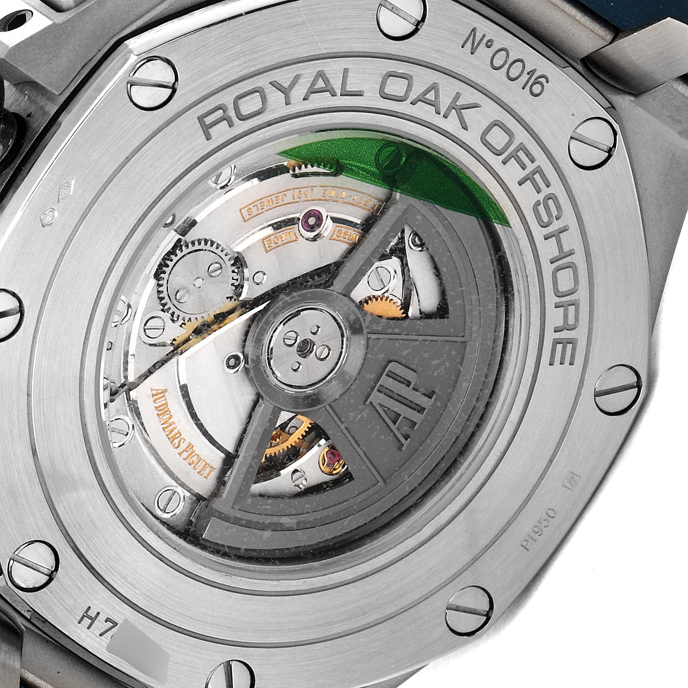 The image shows the back view of the Audemars Piguet Royal Oak Offshore 26401PO.OO.A018CR.01 Men's Platinum Blue Dial 26401PO.OO.A018CR.01 Men's Platinum Blue Dial model, highlighting the exposed movement and rotor.
