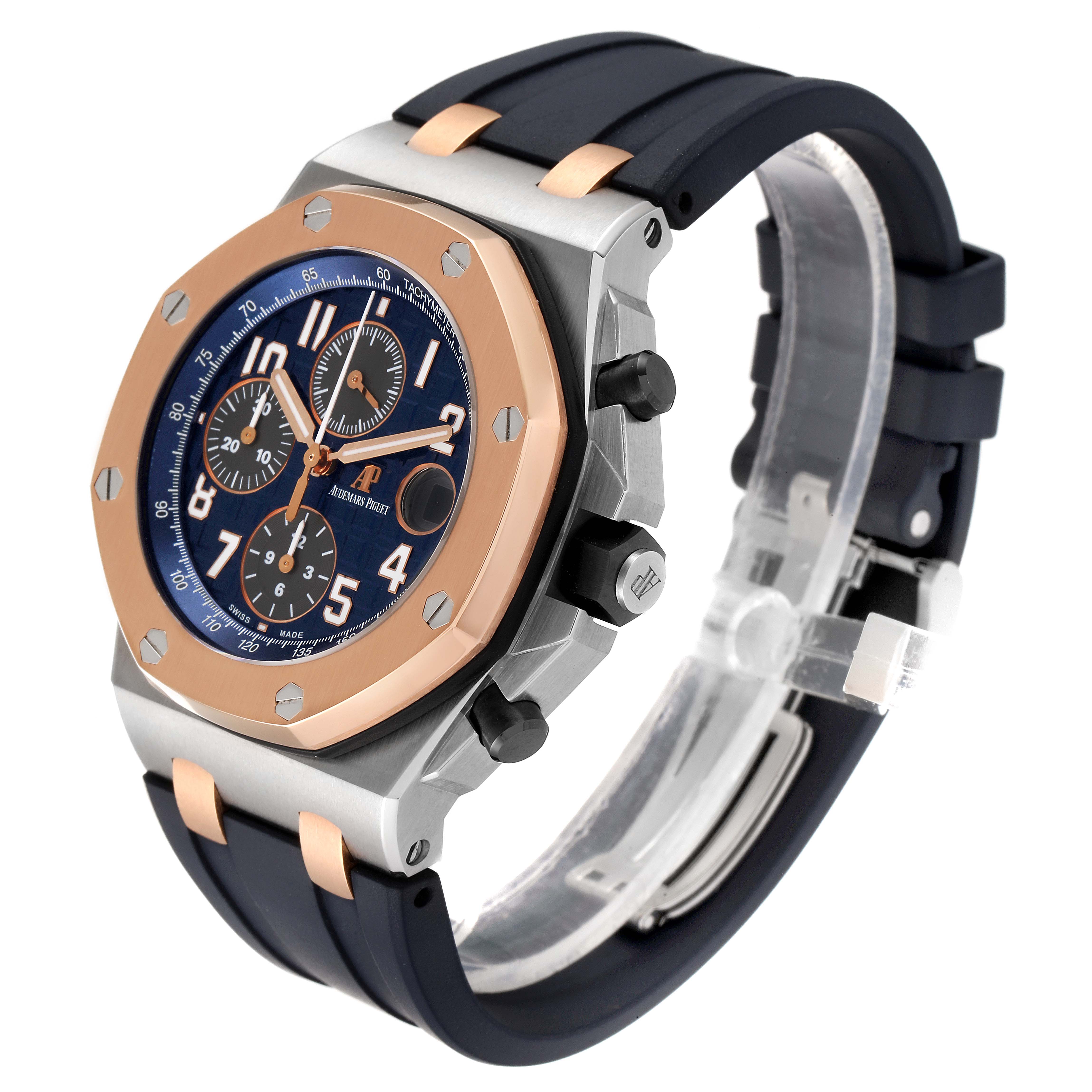 The image shows an angled view of the Audemars Piguet Royal Oak Offshore 26471SR.OO.D101CR.01 Men's Steel and Gold (two tone) Blue Dial 26471SR.OO.D101CR.01 Men's Steel and Gold (two tone) Blue Dial watch, highlighting the front dial, bezel, and strap.