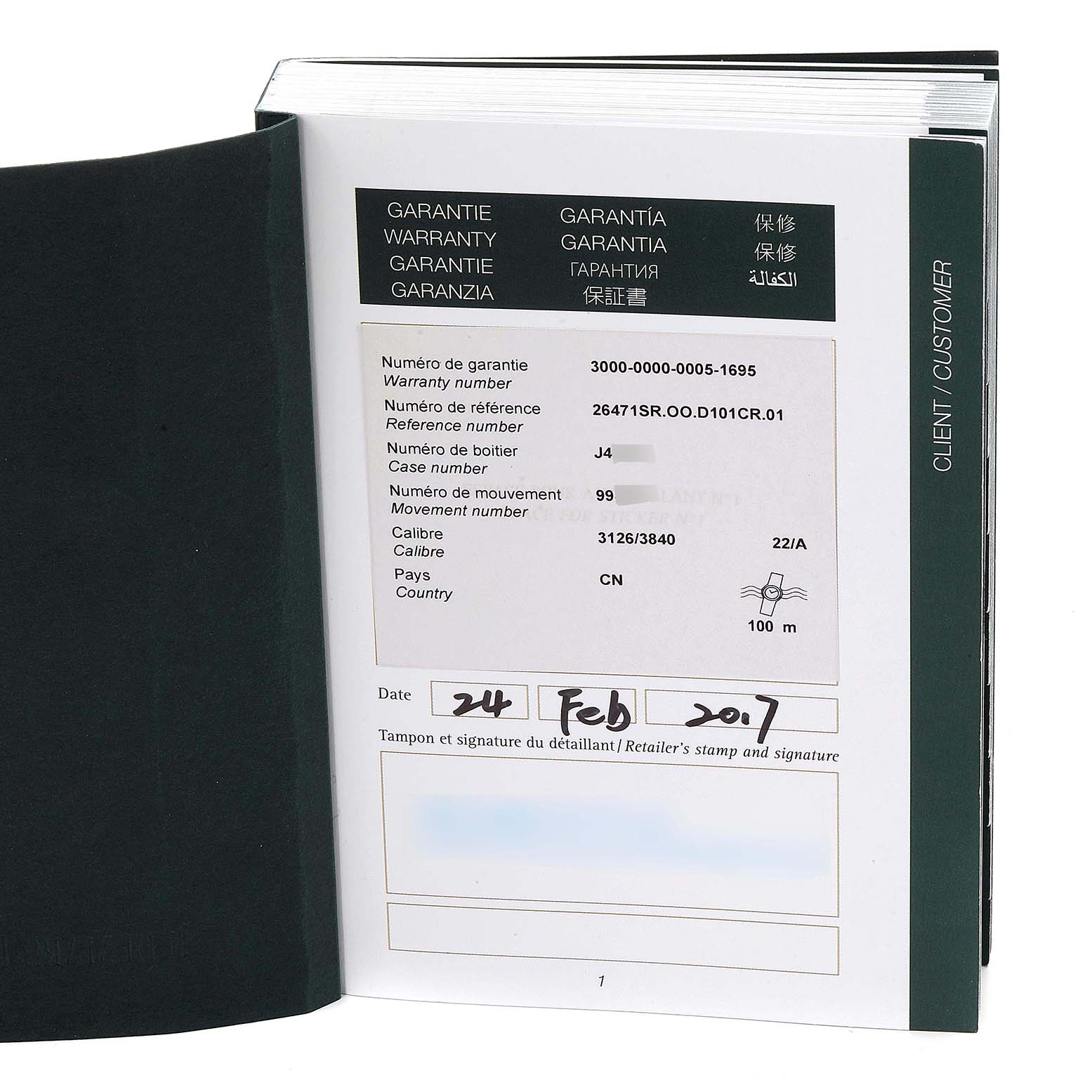 This image shows the open warranty booklet for an Audemars Piguet Royal Oak Offshore 26471SR.OO.D101CR.01 Men's Steel and Gold (two tone) Blue Dial 26471SR.OO.D101CR.01 Men's Steel and Gold (two tone) Blue Dial model.