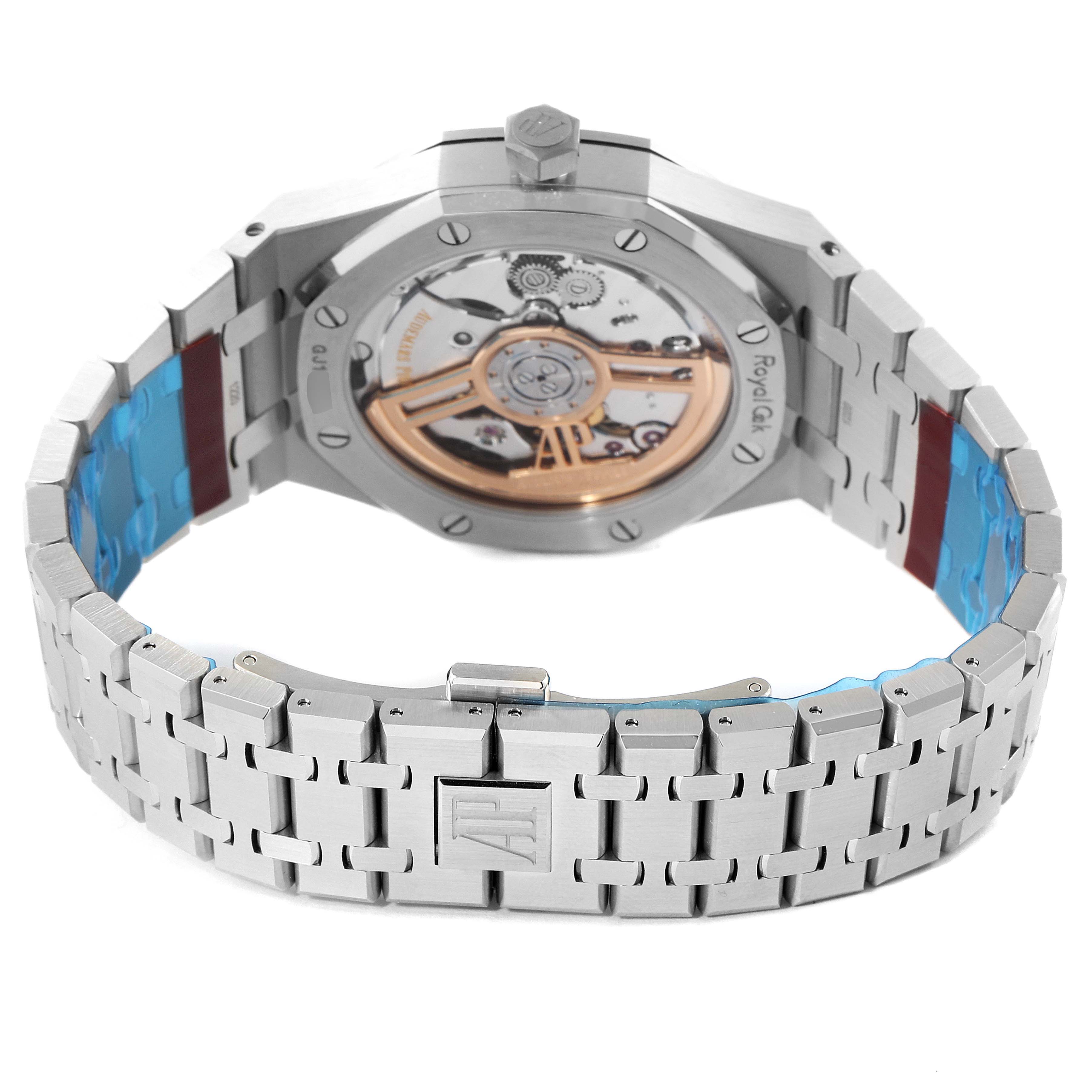 The image shows the back view and bracelet of an Audemars Piguet Royal Oak 15500ST.OO.1220ST.04 Men's Stainless Steel Silver Dial 15500ST.OO.1220ST.04 Men's Stainless Steel Silver Dial watch, highlighting its mechanical movement and clasp.