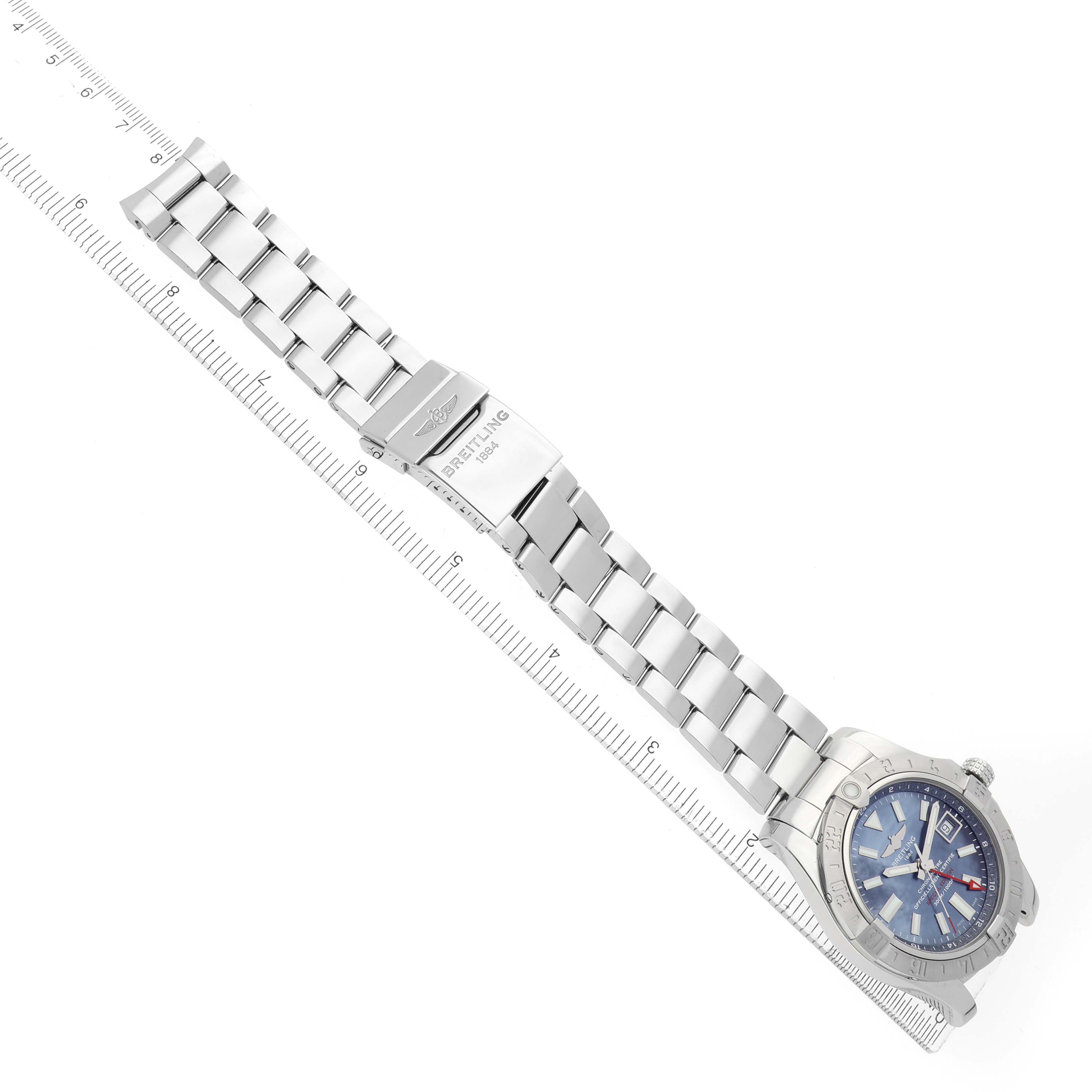 The Breitling Avenger A32390 Men's Stainless Steel Mother of Pearl Dial watch is shown from an angled top view, displaying the face, bezel, and bracelet clasp.