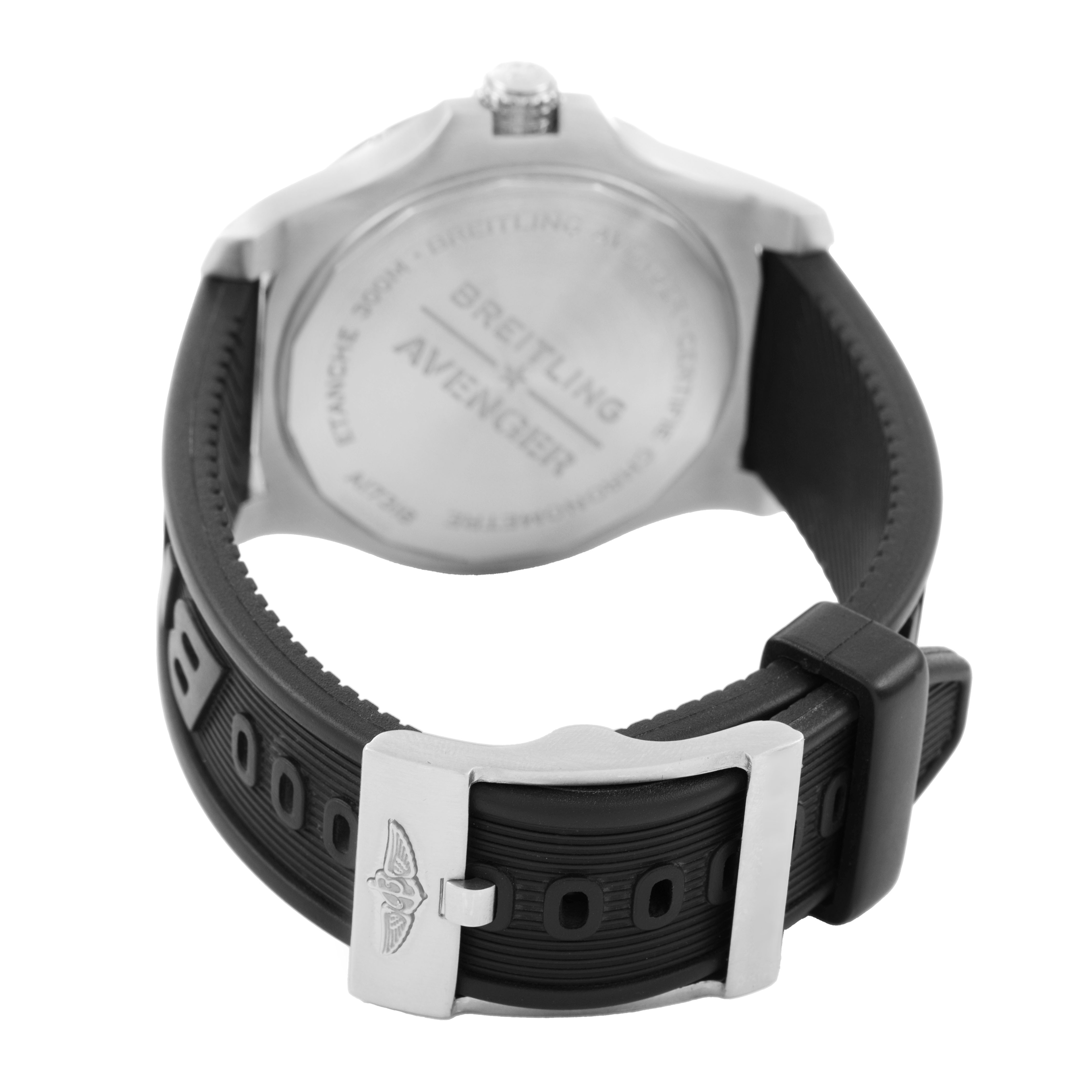 The image shows the back view of the Breitling Avenger A17318 Men's Stainless Steel Black Dial watch, highlighting the case back and black rubber strap with a silver buckle.