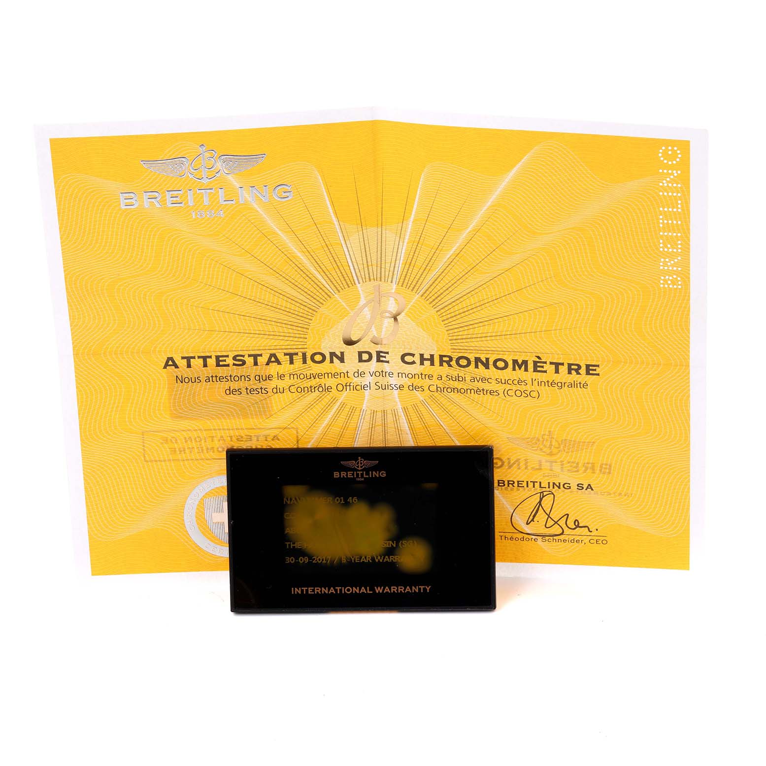 The image shows the Breitling Navitimer AB0127 Men's Stainless Steel Blue Dial AB0127 Men's Stainless Steel Blue Dial warranty card and chronometer certificate from a frontal angle.