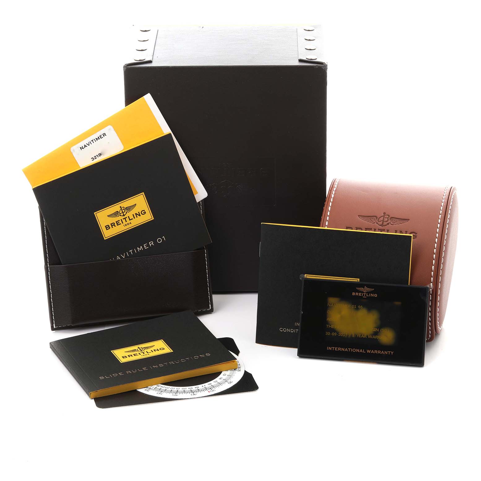 The image shows accessories for the Breitling Navitimer AB0127 Men's Stainless Steel Blue Dial AB0127 Men's Stainless Steel Blue Dial, including boxes, booklets, and a warranty card, viewed from the front.