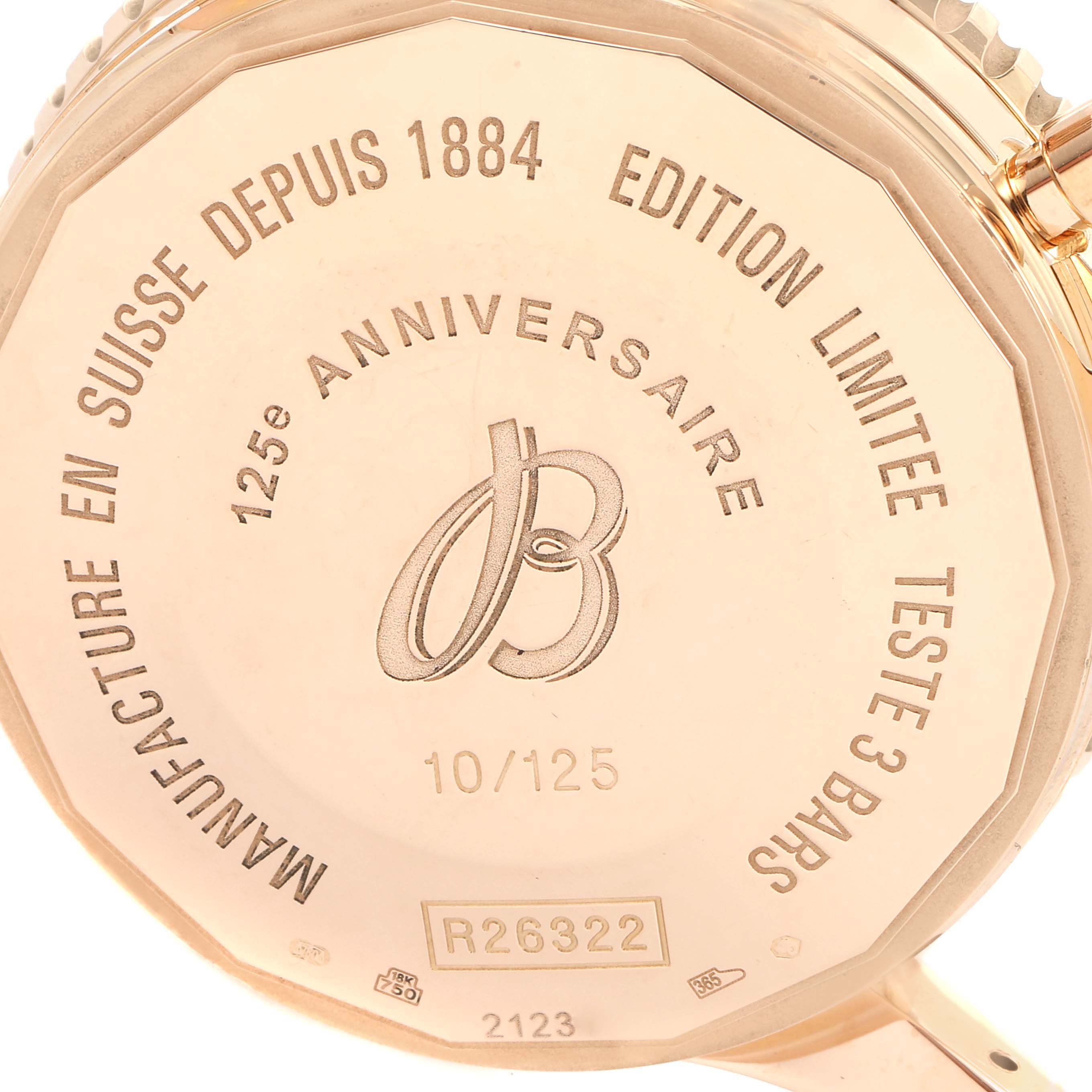 The image shows the case back of a Breitling Navitimer R26322 Men's Rose Gold Silver Dial R26322 Men's Rose Gold Silver Dial watch, highlighting its limited edition engraving and serial number.