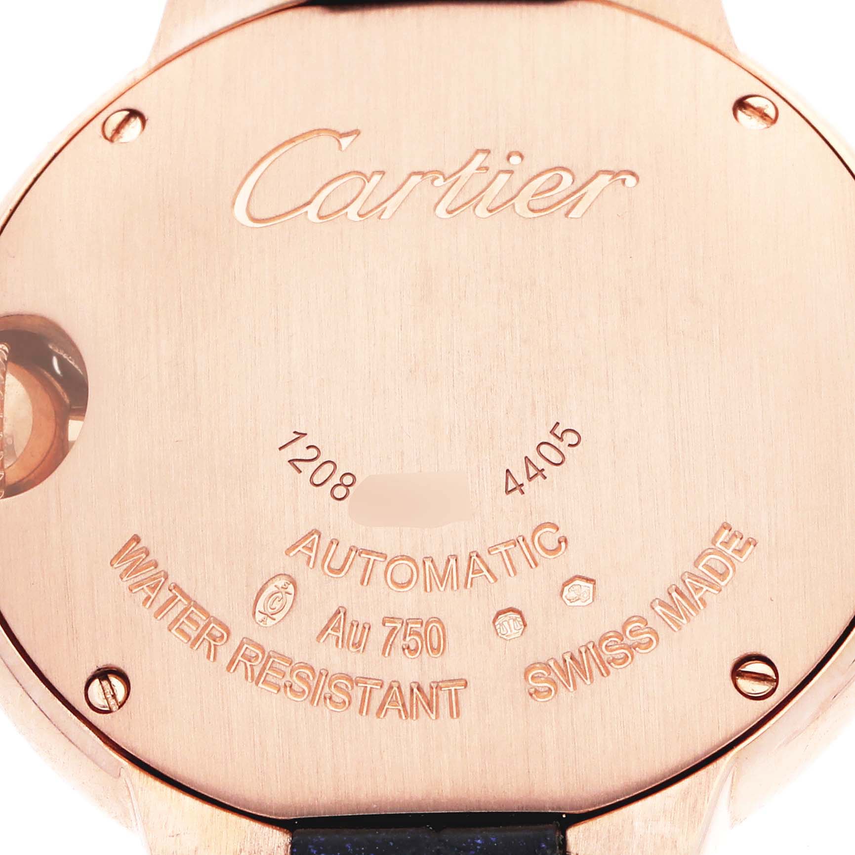 The image shows the back casing of a Cartier Ballon Bleu WGBB0053 Women
s Rose Gold Silver Dial watch, highlighting its engravings and metal details.