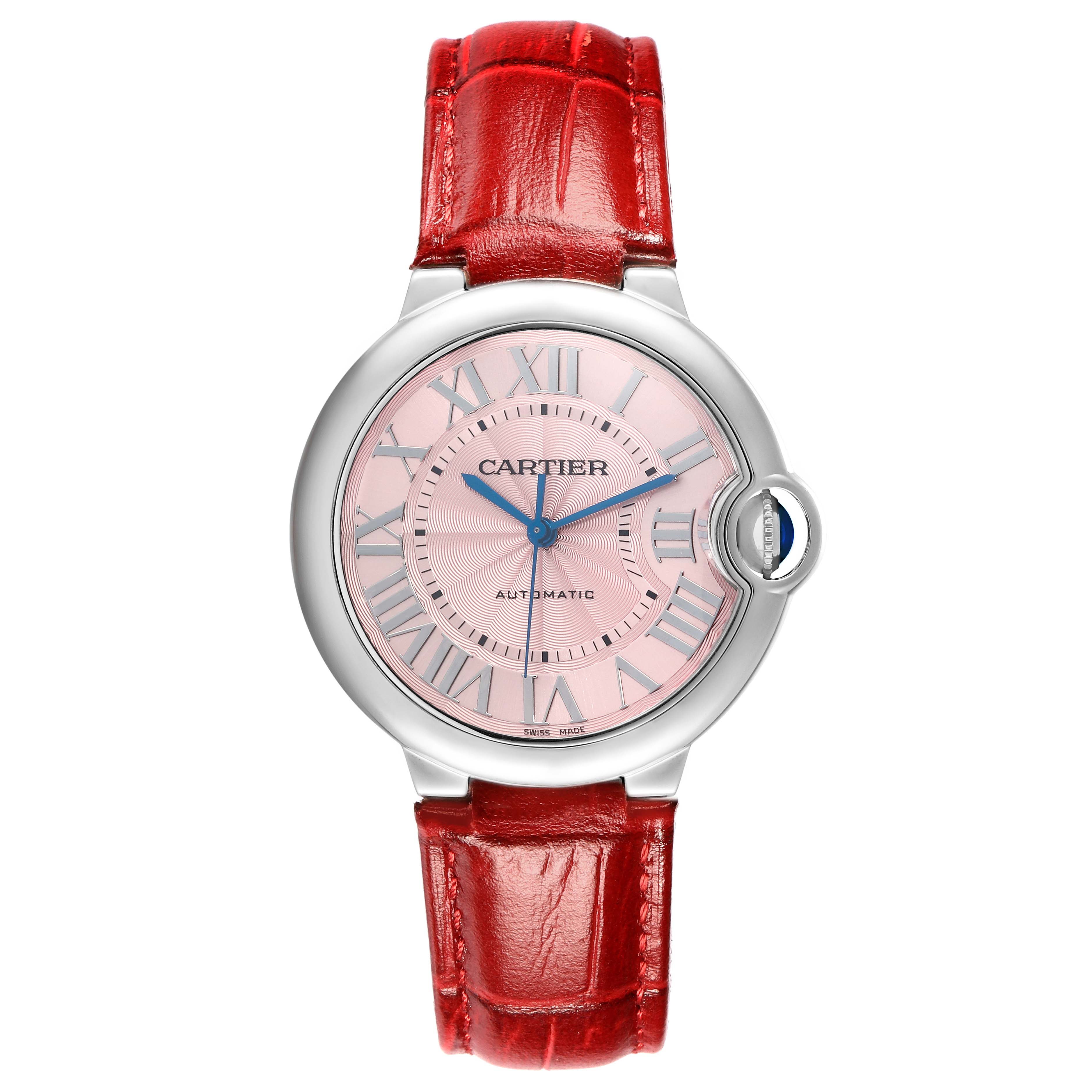 The Ballon Bleu by Cartier is shown from a front angle, displaying the full watch face and red leather strap.