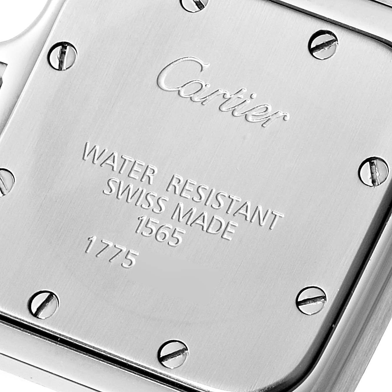 This image shows the back case of a Santos model watch by Cartier, detailing the water resistance and Swiss made specifications.