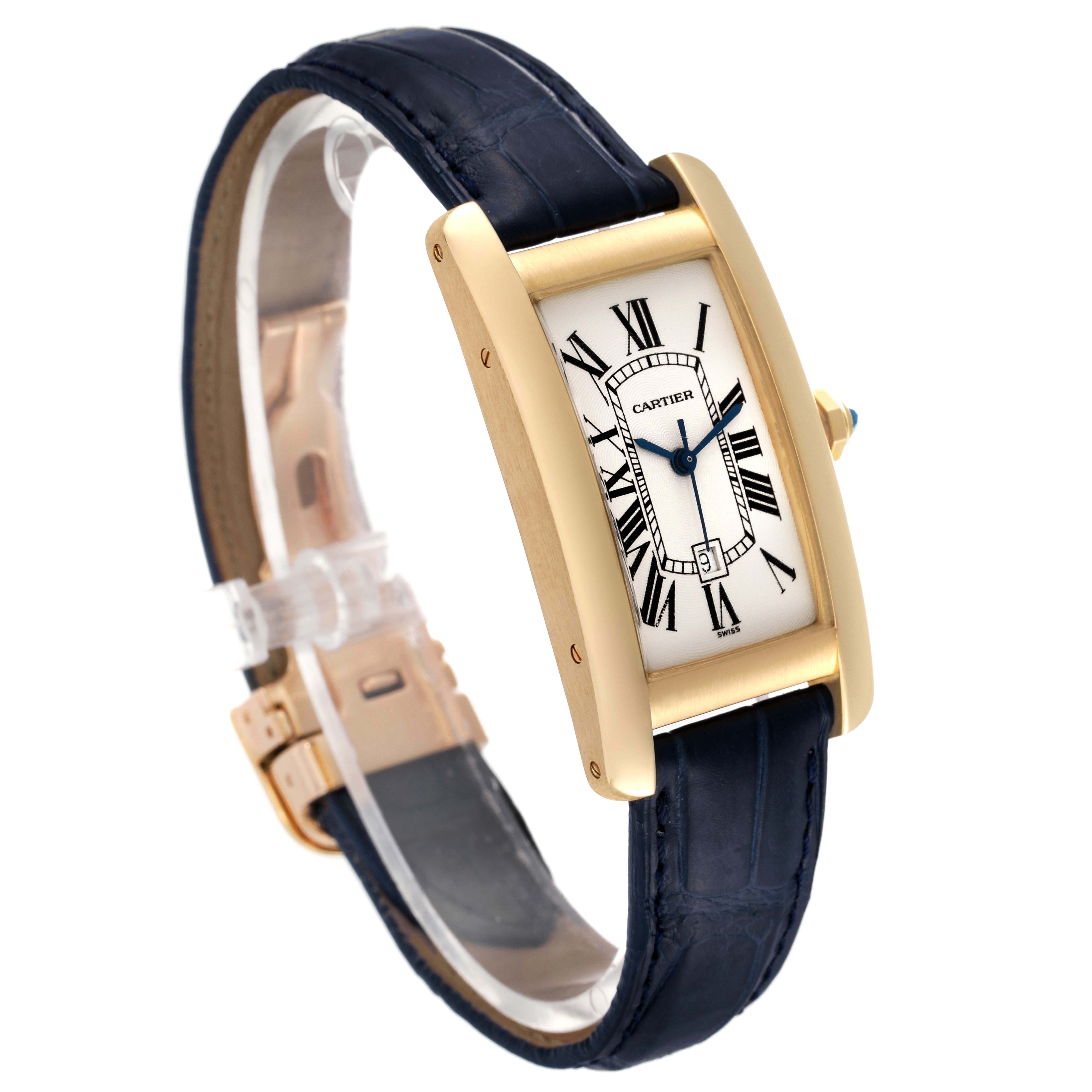 The Cartier Tank Americaine W2603556 Men
s Yellow Gold Silver Dial W2603556 Men
s Yellow Gold Silver Dial watch is shown from an angled view, highlighting its rectangular gold case, Roman numeral dial, and black leather strap.