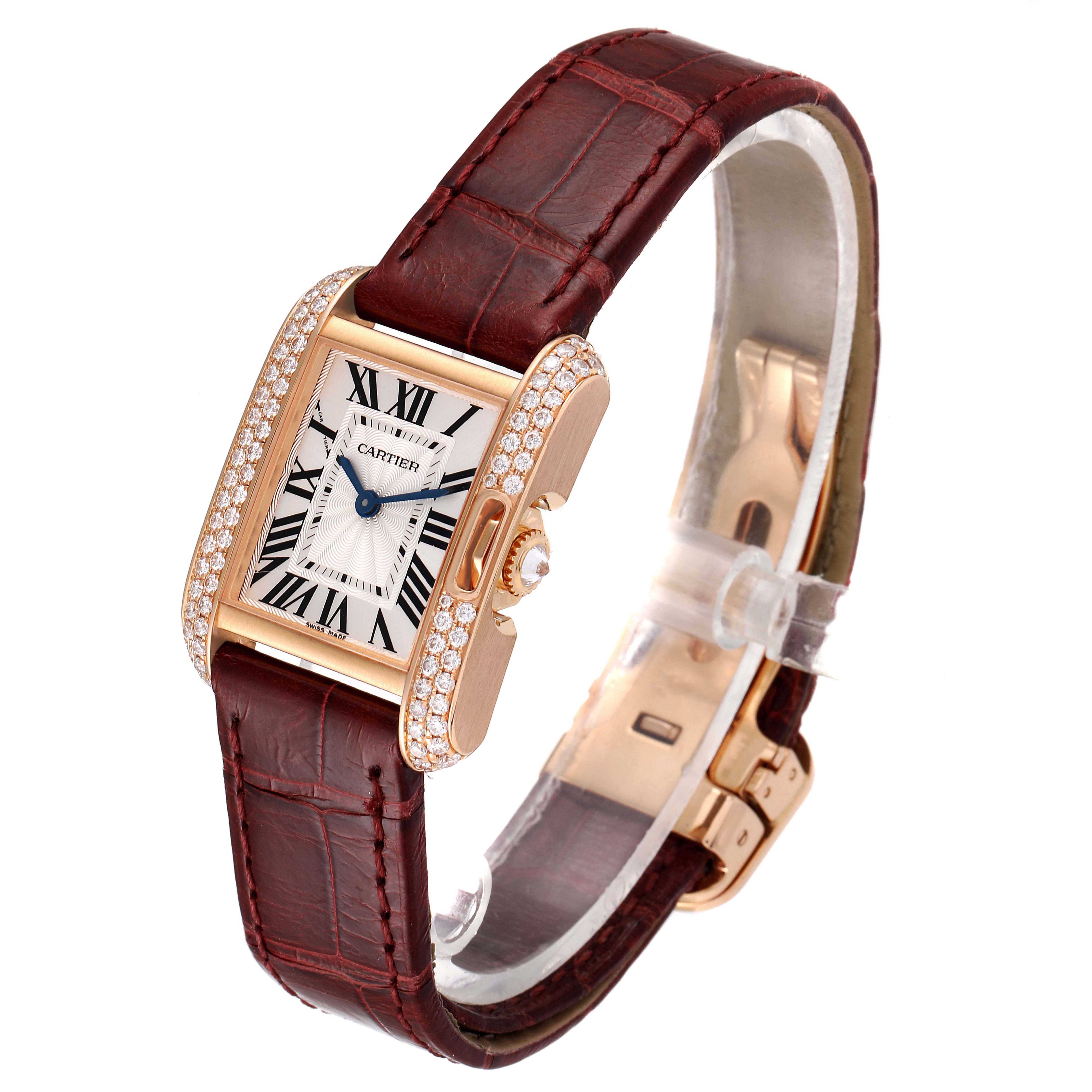 This image shows a Cartier Tank Anglaise WT100013 Women's Rose Gold Silver Dial WT100013 Women's Rose Gold Silver Dial watch at an oblique angle, highlighting its diamond-set bezel and leather strap.