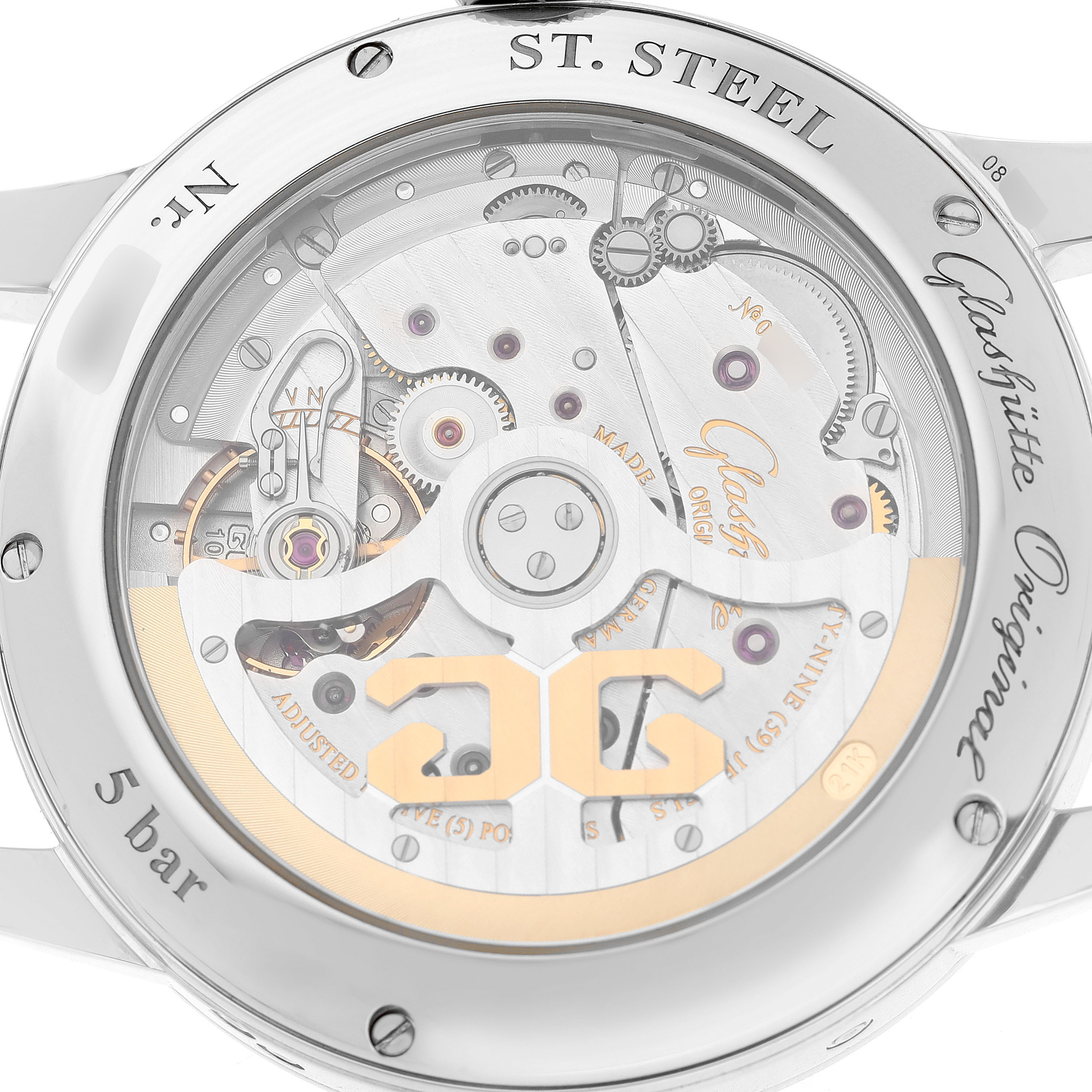The image shows the back view of a Glashütte Original watch, revealing its mechanical movement and inner workings.