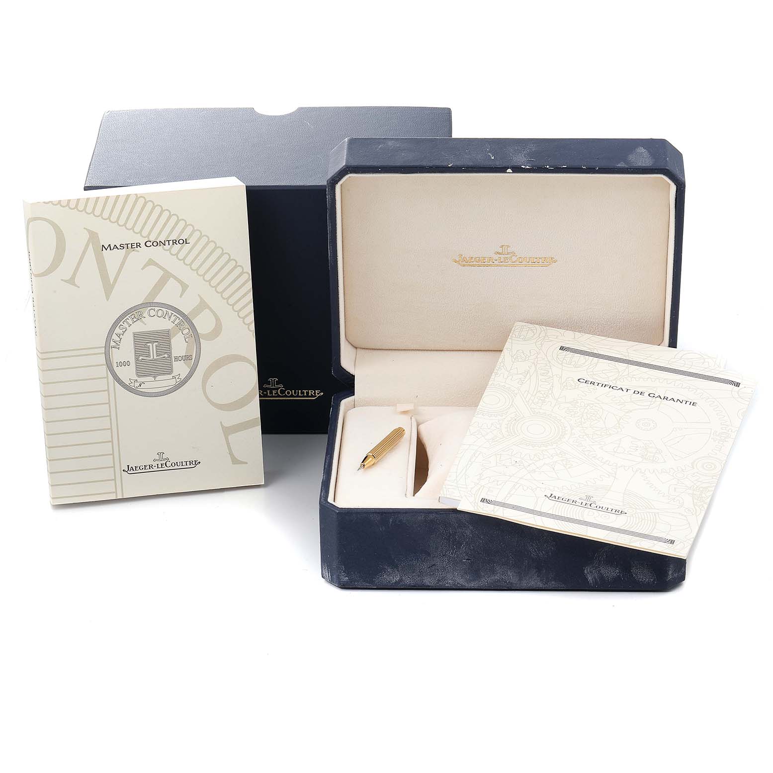 This image shows the packaging, manuals, and a tool for the Jaeger-LeCoultre Master model watch.