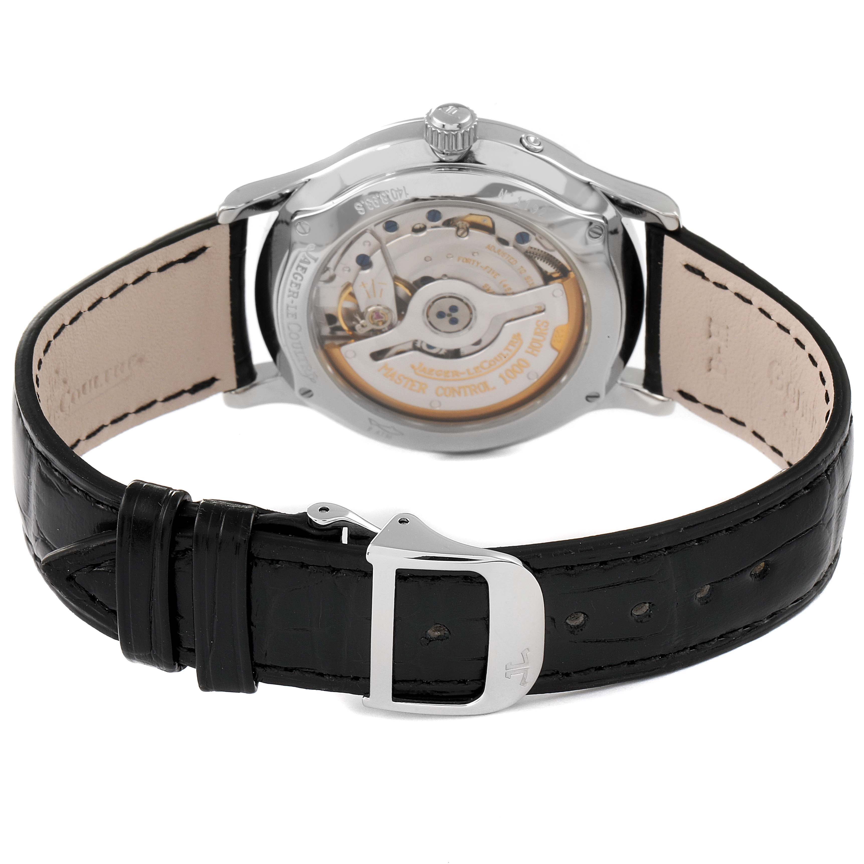 This image shows the back view of a Jaeger LeCoultre Master Q1488470 Men's Stainless Steel Black Dial Q1488470 Men's Stainless Steel Black Dial model watch, highlighting the movement mechanism and the leather strap.
