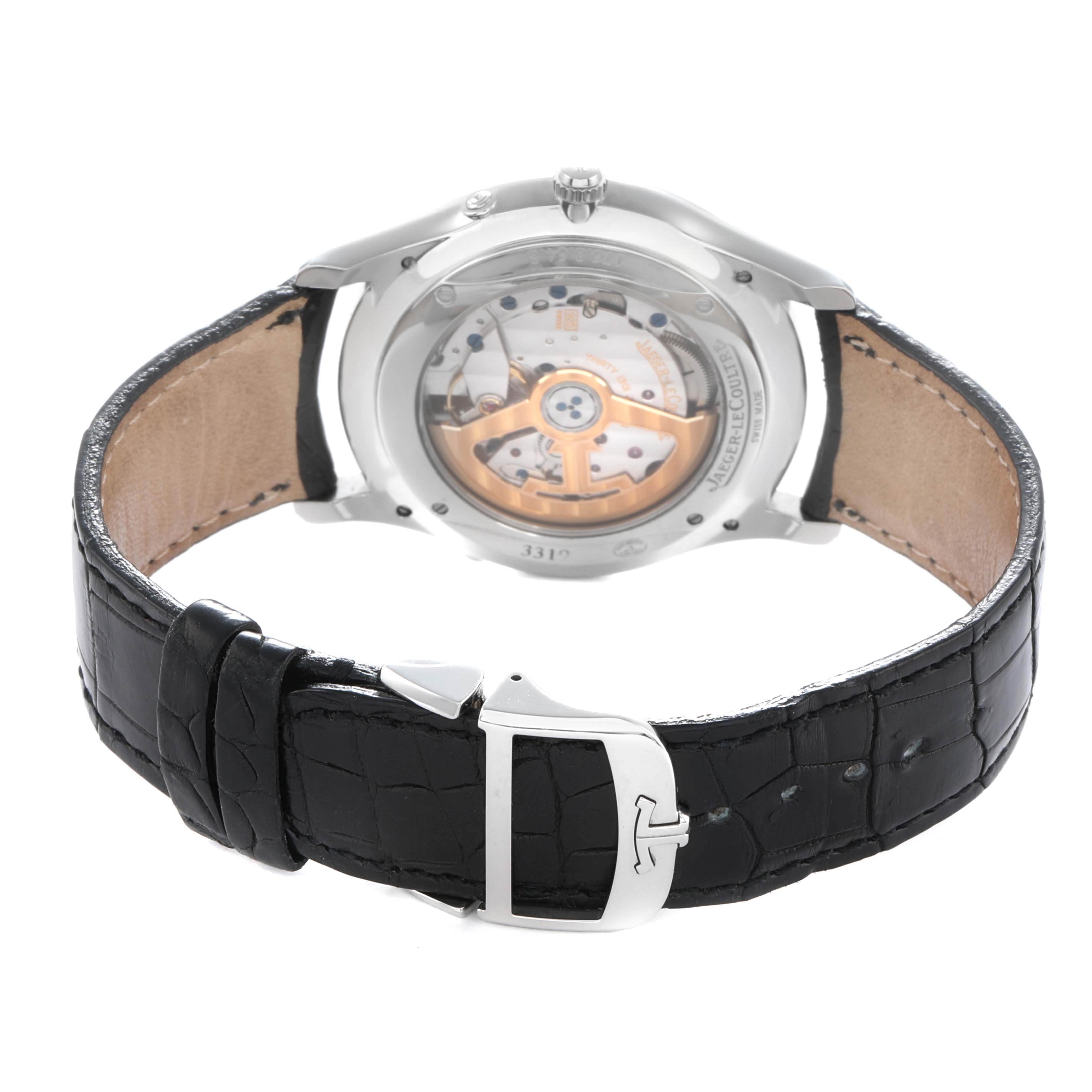 The image shows the back view of a Jaeger LeCoultre Master Q1368470 Men's Stainless Steel Black Dial model, displaying the transparent case back and black leather strap.