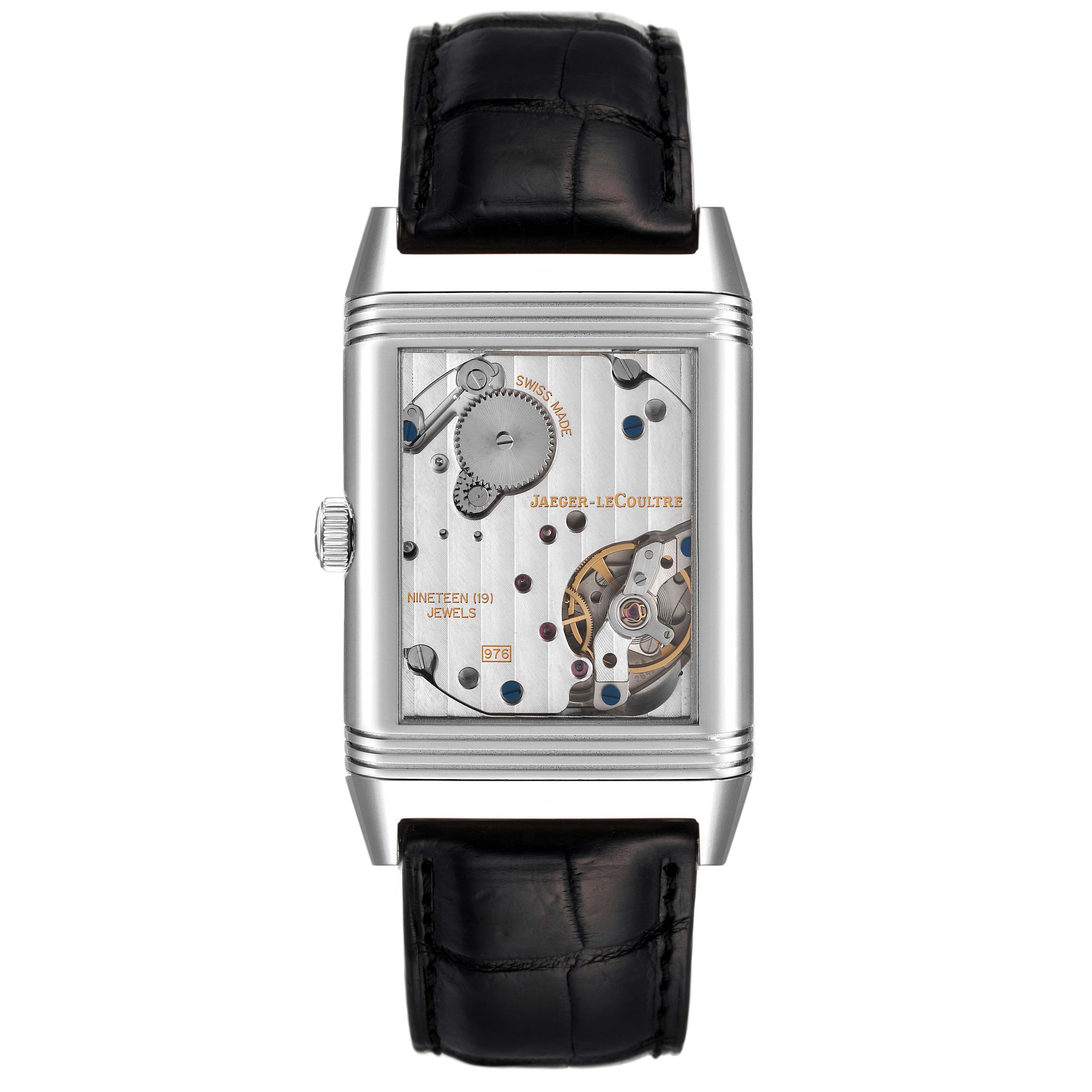 This Jaeger-LeCoultre Reverso watch shows the back view with visible mechanical parts and a black leather strap.