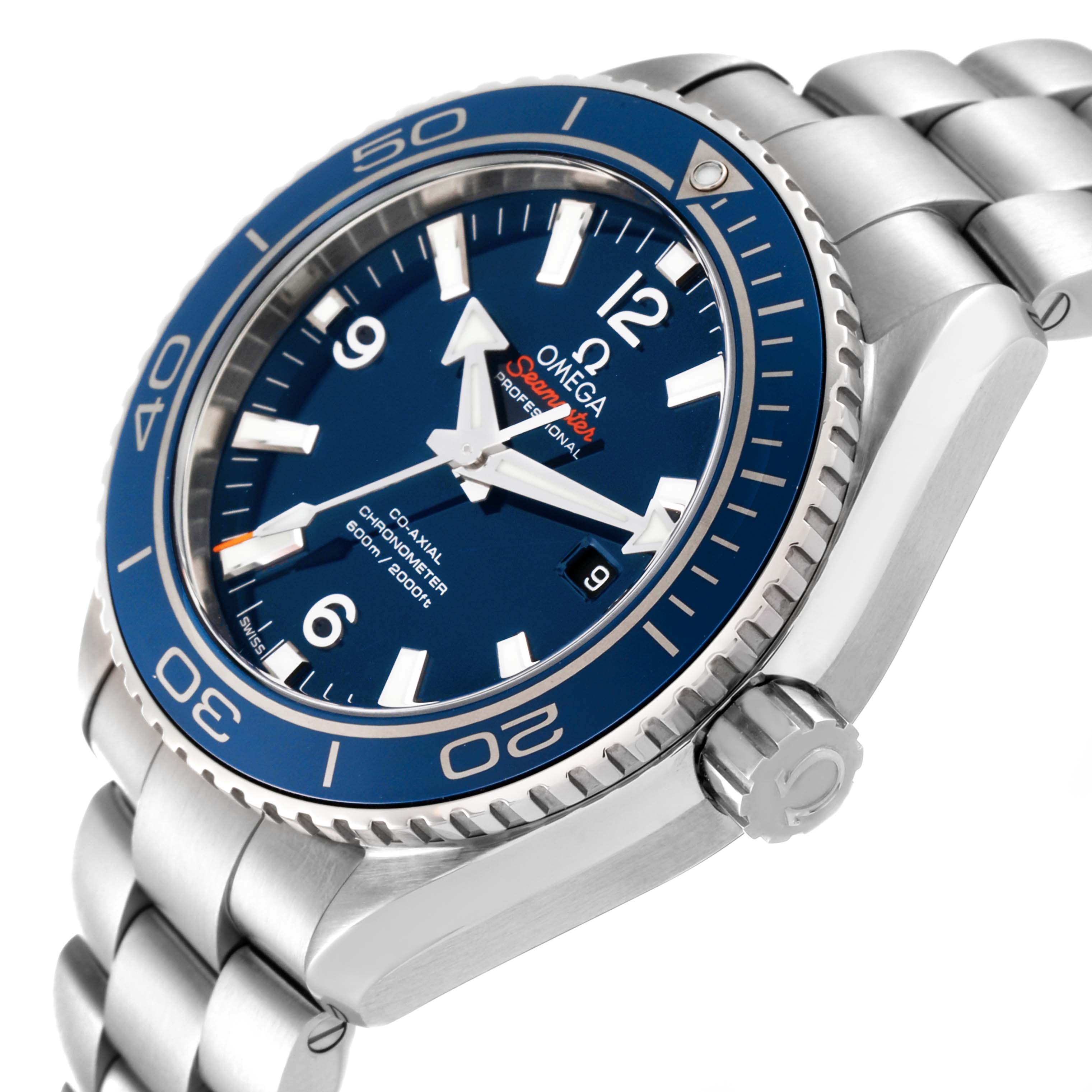 The Omega Planet Ocean 232.90.38.20.03.001 Men's Titanium Blue Dial watch is shown from a three-quarter angle, highlighting the blue dial, bezel, and stainless steel bracelet.