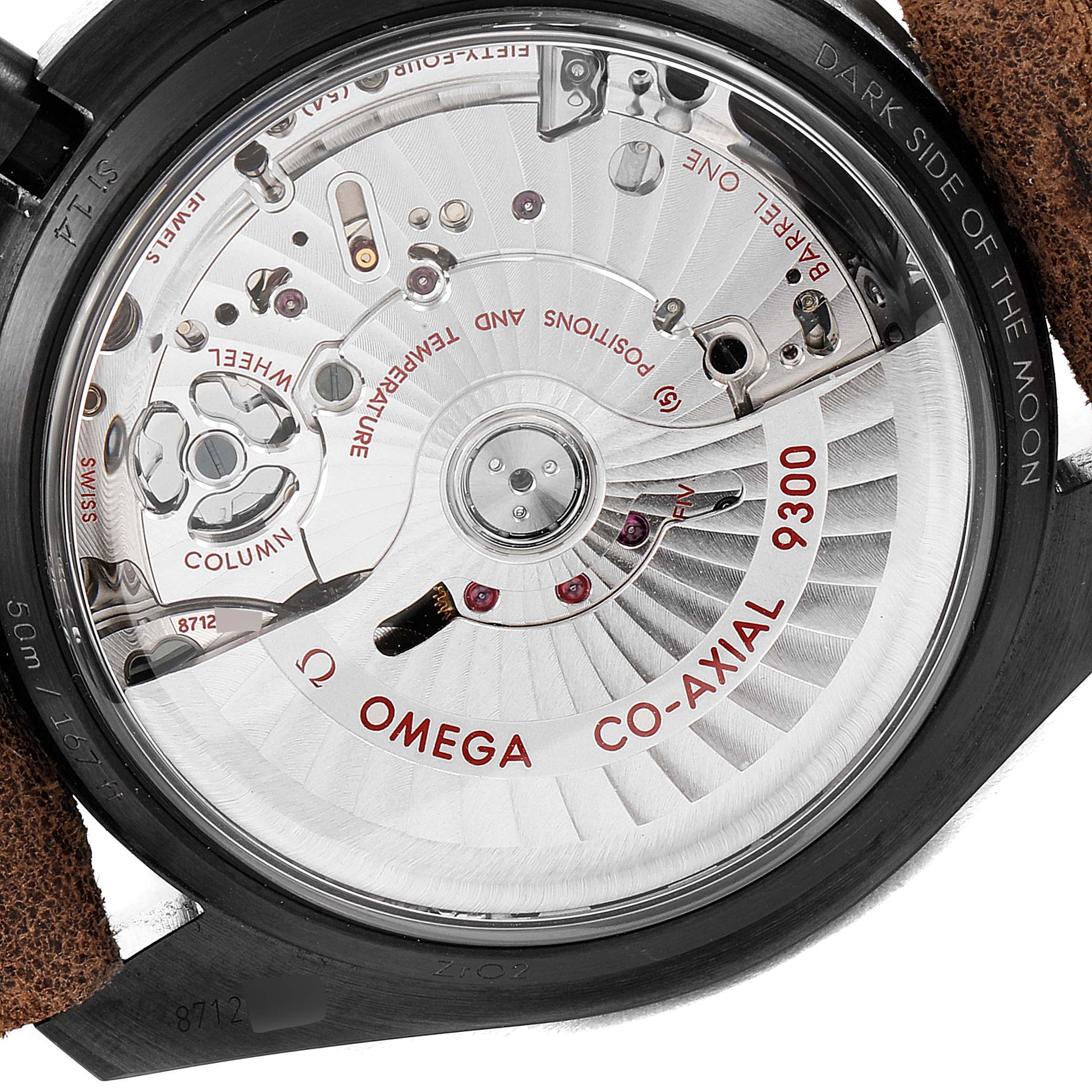 Close-up of the Omega Speedmaster 311.92.44.51.01.006 Men's Stainless Steel Black Dial 311.92.44.51.01.006 Men's Stainless Steel Black Dial movement showcasing the intricate workings and the "Dark Side of the Moon" engraving.