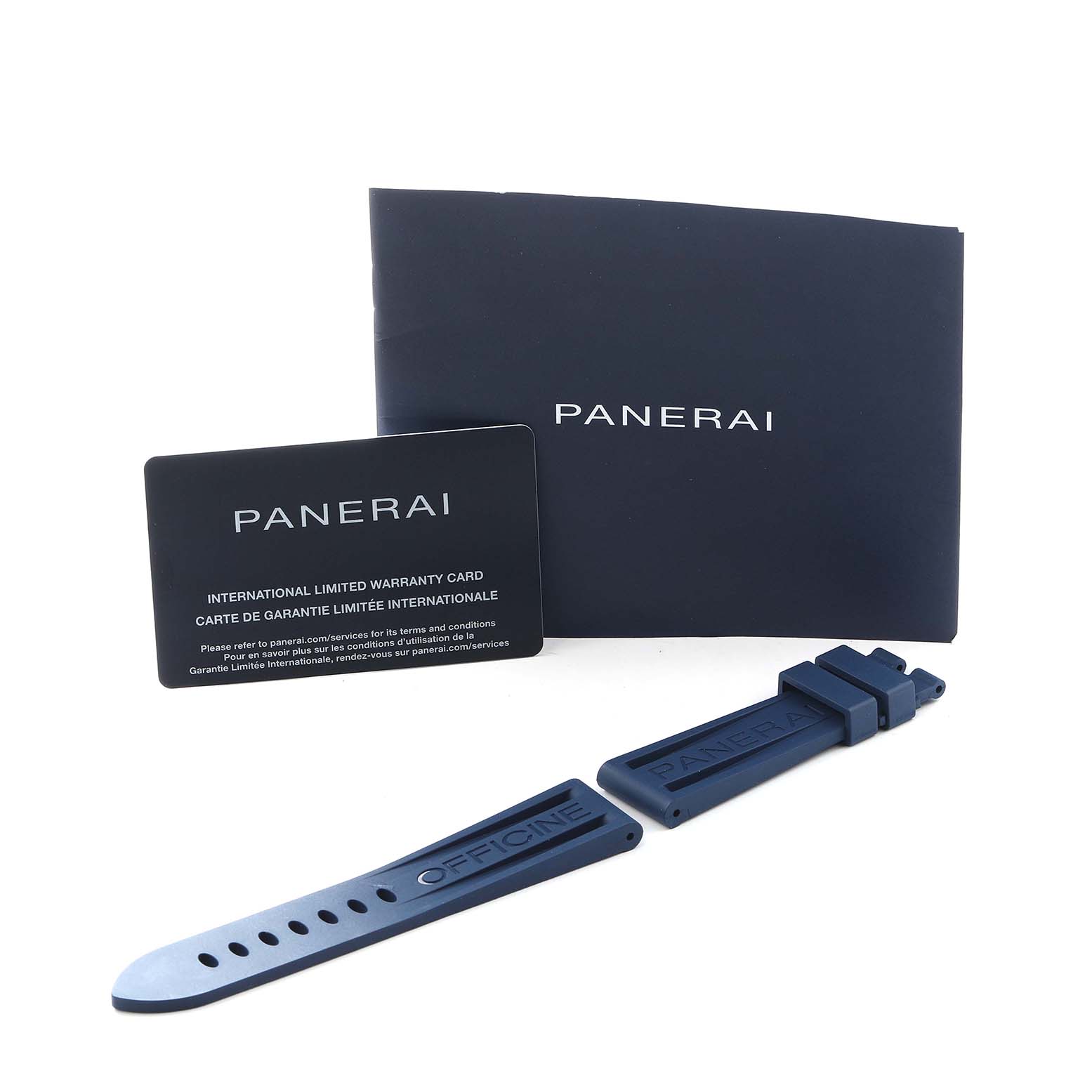 The image shows a Panerai Luminor PAM01408 Men
s Stainless Steel Blue Dial watch strap, warranty card, and booklet from a top angle.