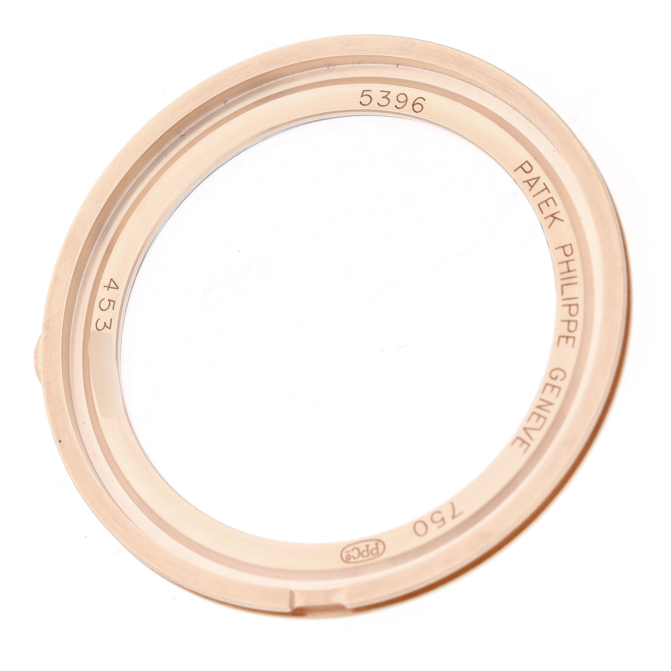 The image shows the back cover of a Patek Philippe Complications 5396R-001 Men's Rose Gold Silver Dial model, viewed from above, displaying inscriptions and markings.