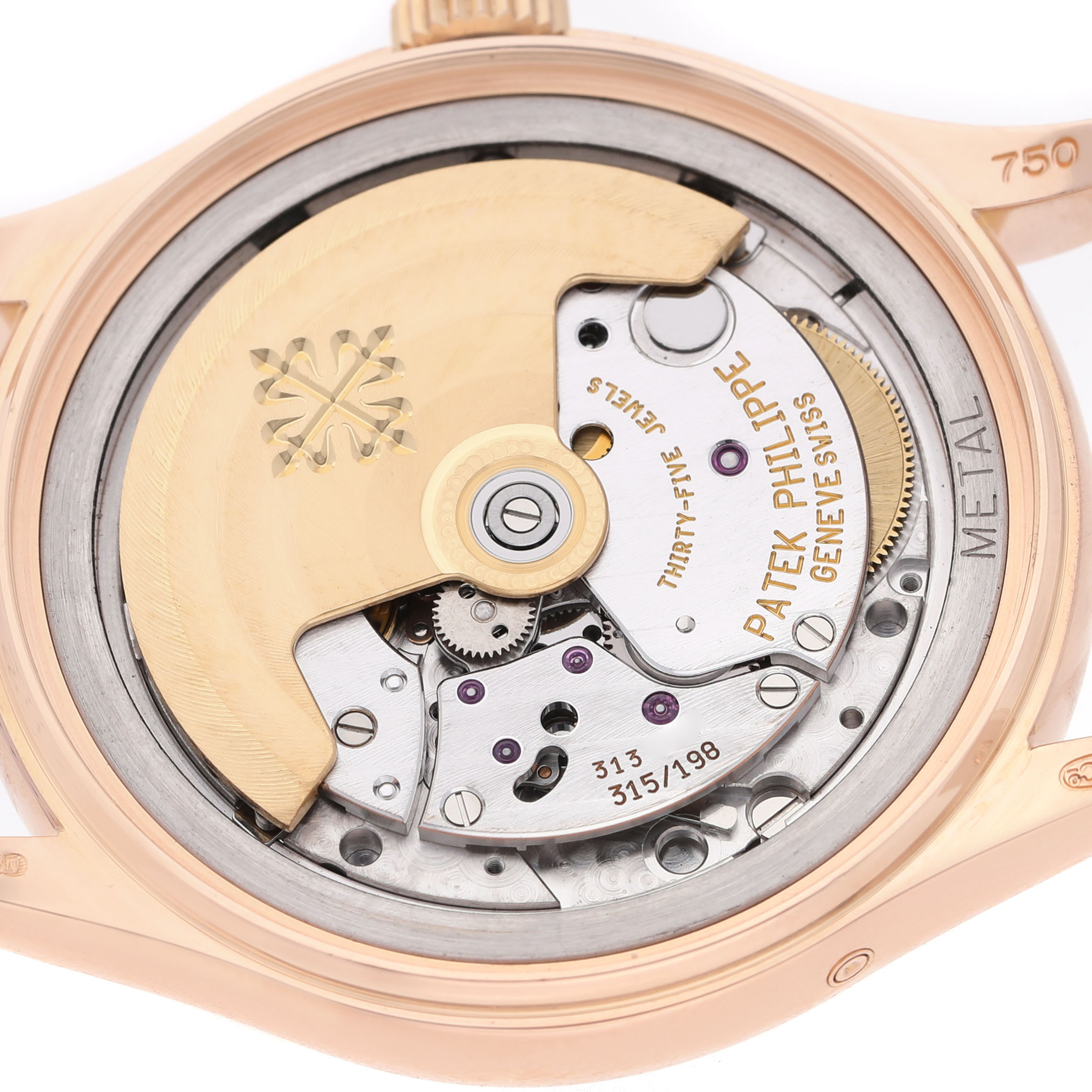 This image shows the back view of a Patek Philippe Complications 5035R-001 Men's Rose Gold Black Dial model, highlighting its intricate movement and rotor.