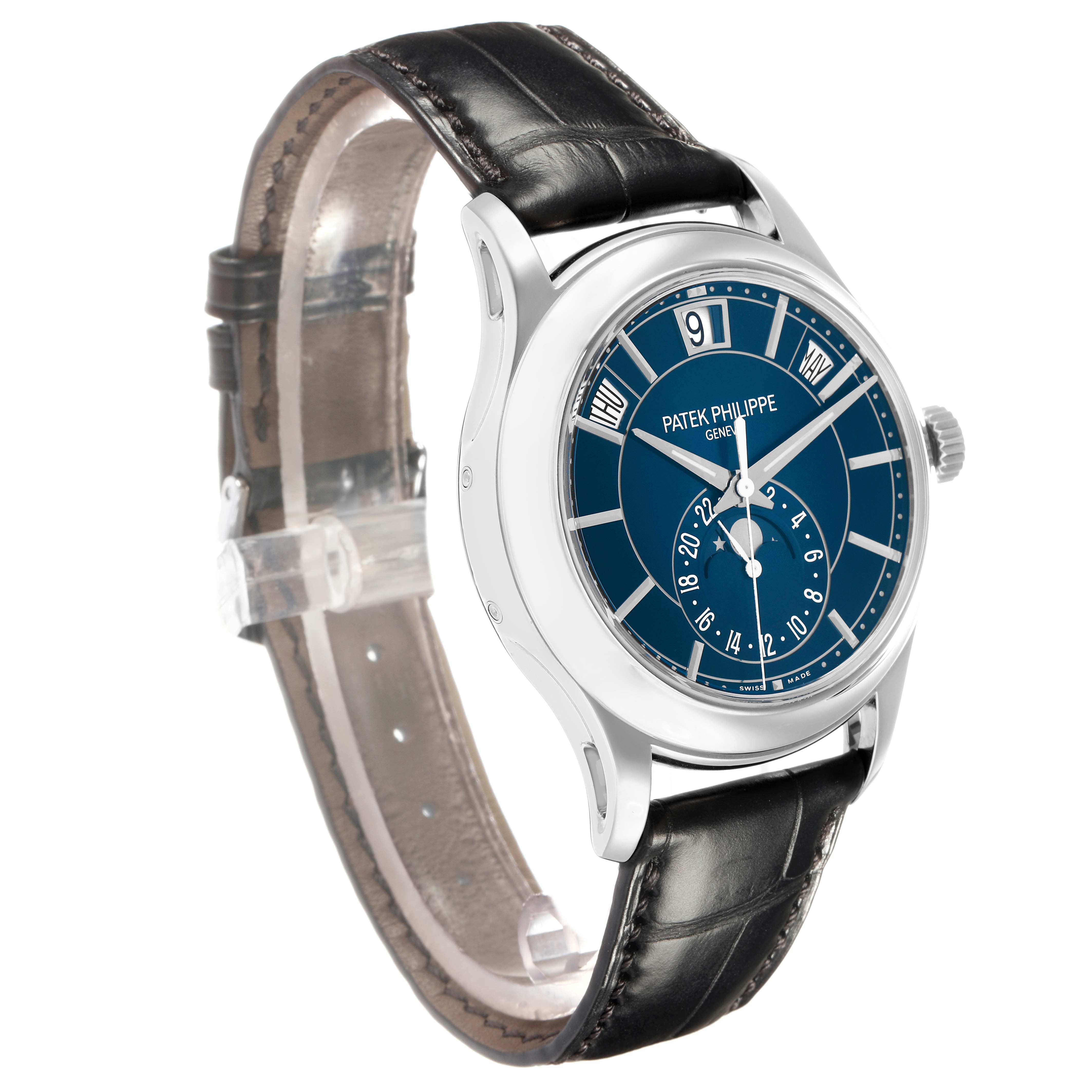 The Patek Philippe Complications 5205G-013 Men
s White Gold Blue Dial watch is shown from an angled side view, highlighting the dial, case, crown, and leather strap.