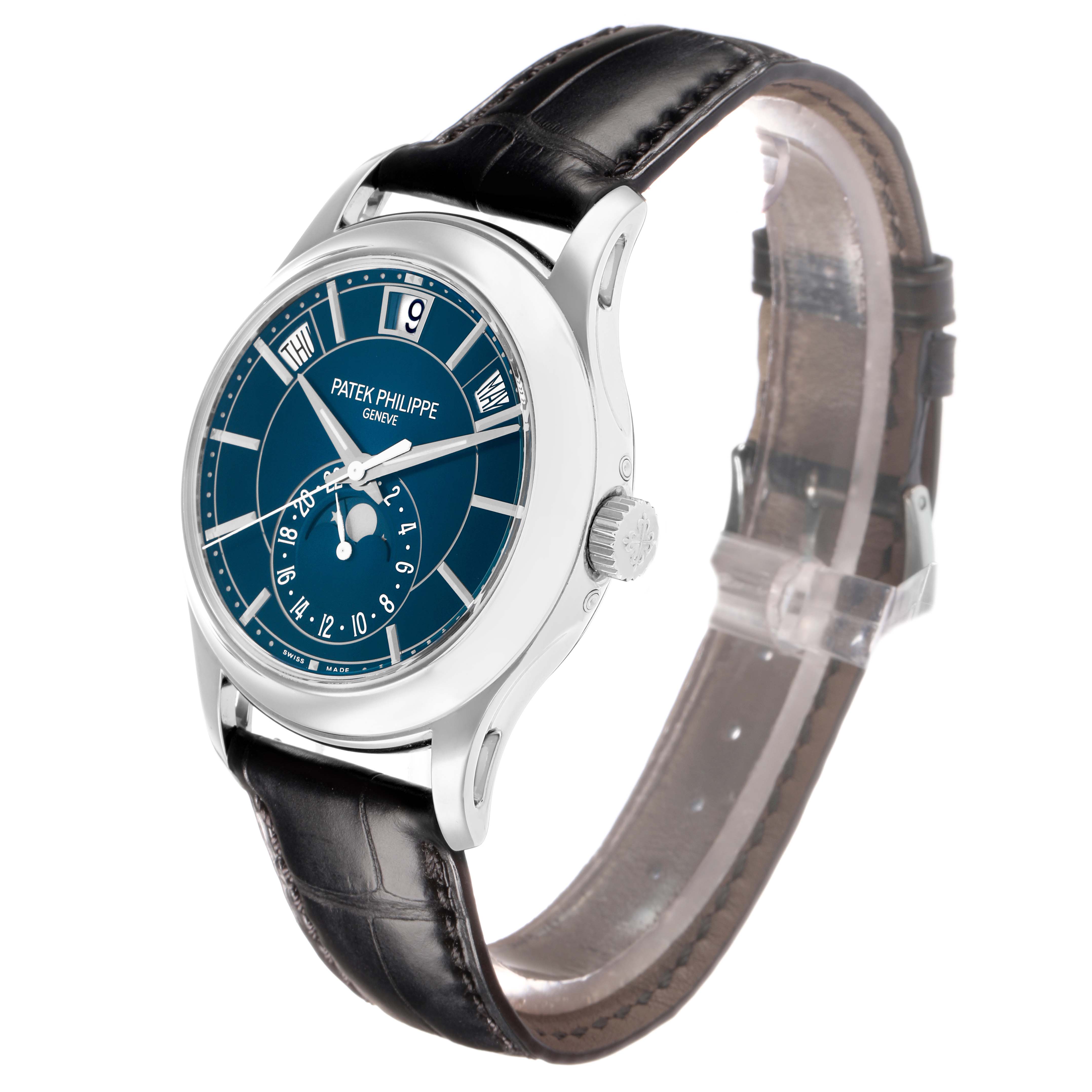 The image shows a Patek Philippe Complications 5205G-013 Men
s White Gold Blue Dial watch at a three-quarter angle, highlighting the dial, bezel, crown, and strap.