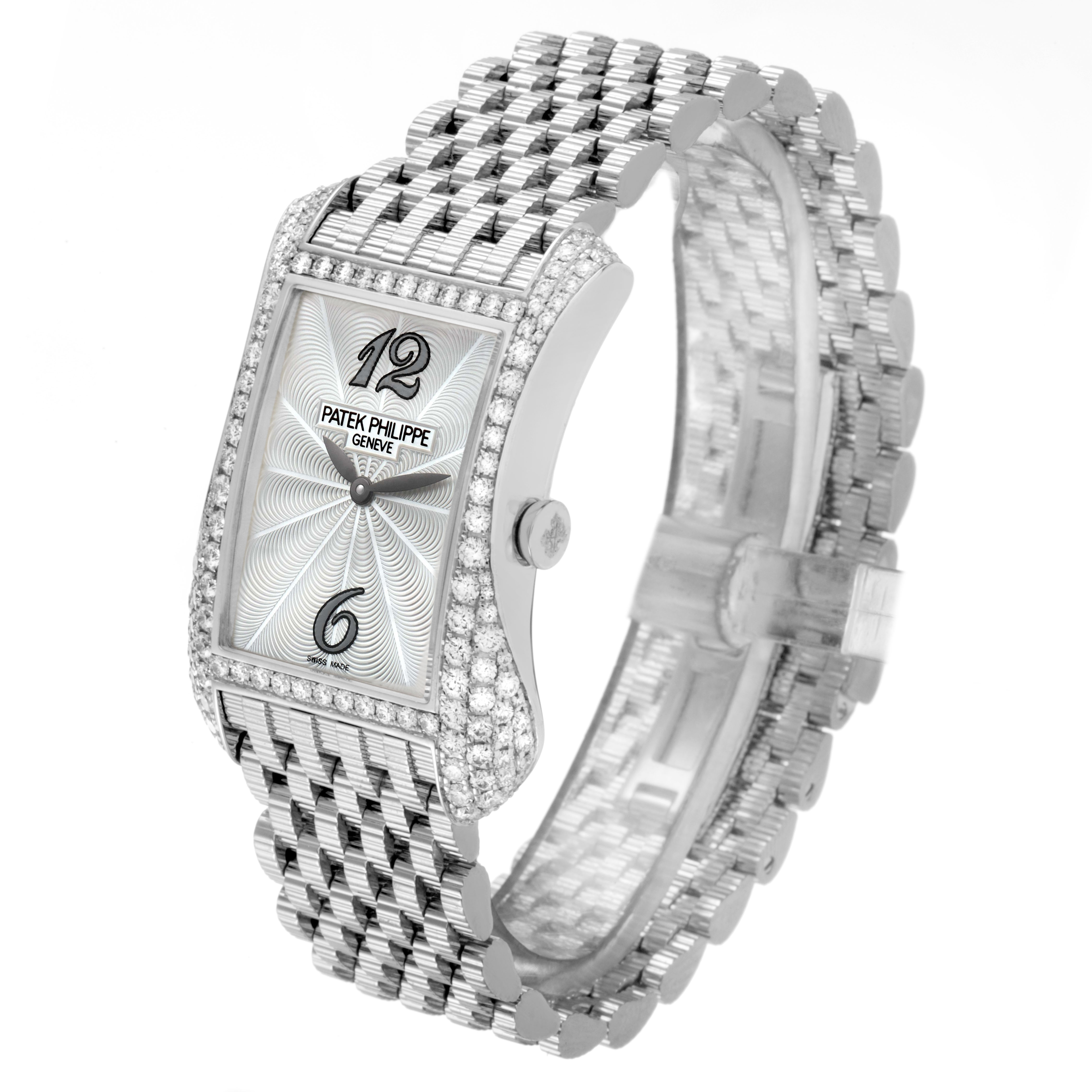The Patek Philippe Gondolo 4972/1G-001 Women's White Gold Mother of Pearl Dial watch is shown at an angle highlighting its dial, diamond-set bezel, and metal bracelet.
