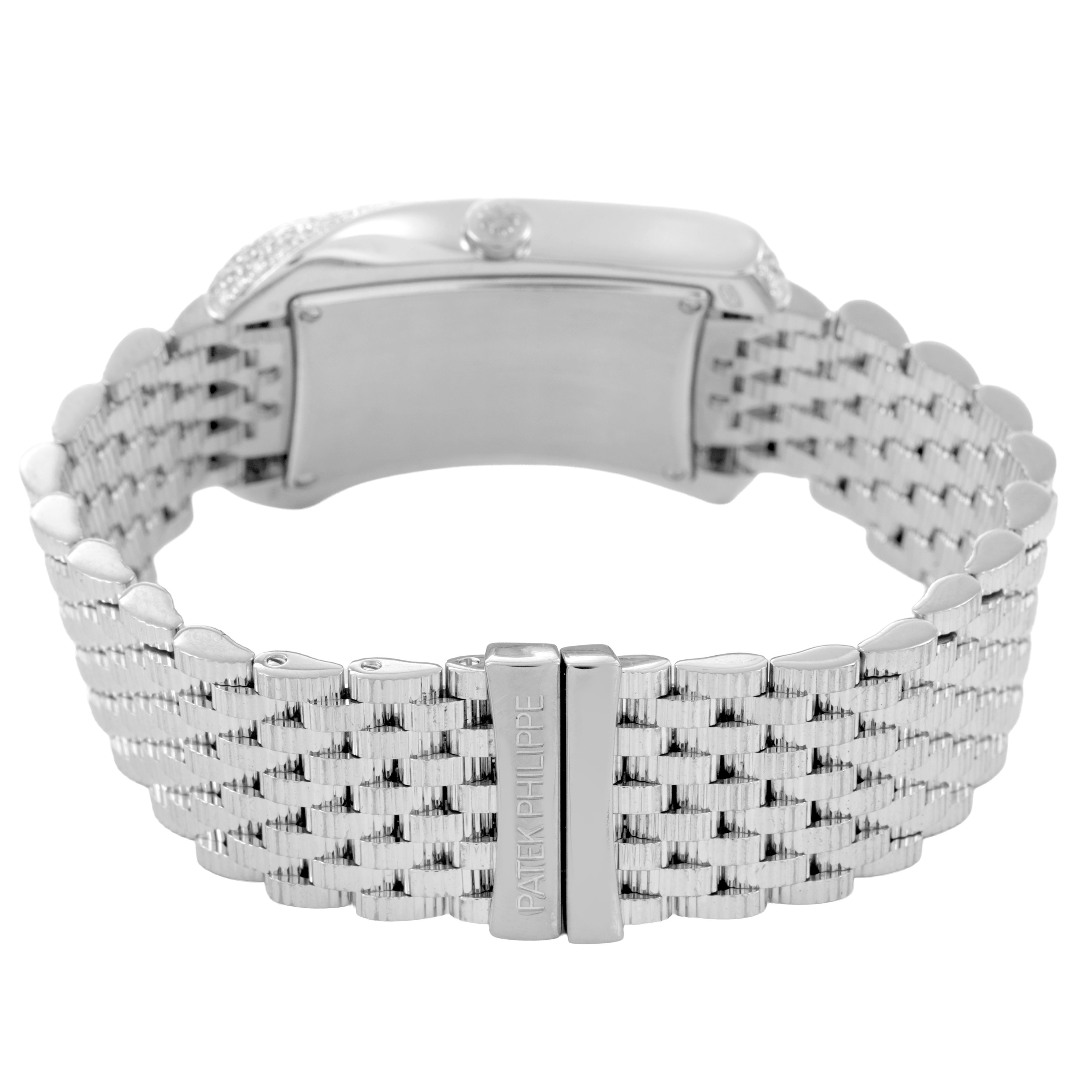 The image shows the back view of a Patek Philippe Gondolo 4972/1G-001 Women's White Gold Mother of Pearl Dial watch focusing on the clasp and bracelet.