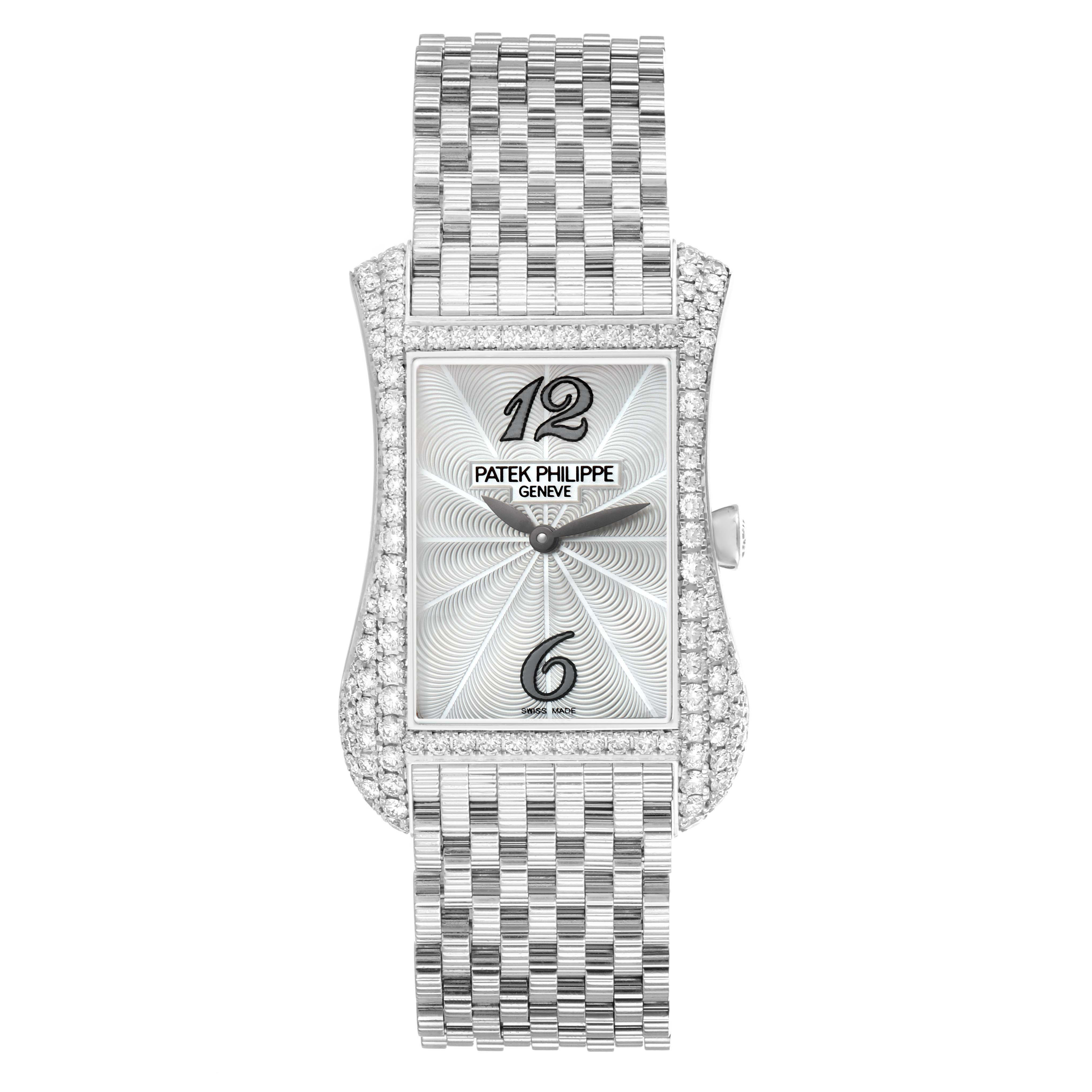 The Patek Philippe Gondolo 4972/1G-001 Women's White Gold Mother of Pearl Dial watch is shown from a front view, highlighting its rectangular dial and intricate bracelet.