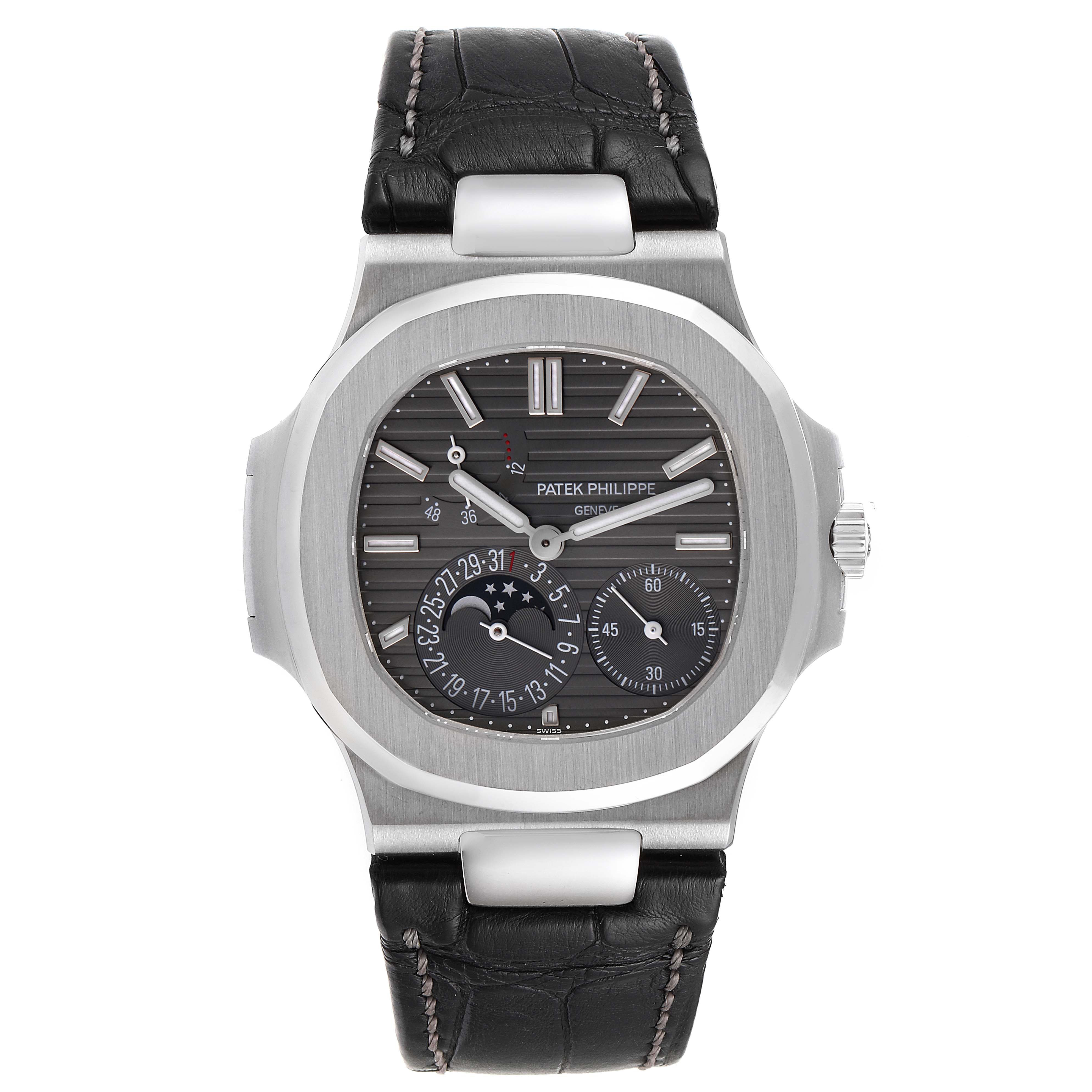 The image shows a front view of a Patek Philippe Nautilus 5712G/001 Men's White Gold Grey Dial 5712G/001 Men's White Gold Grey Dial watch, highlighting the dial, case, and leather strap.