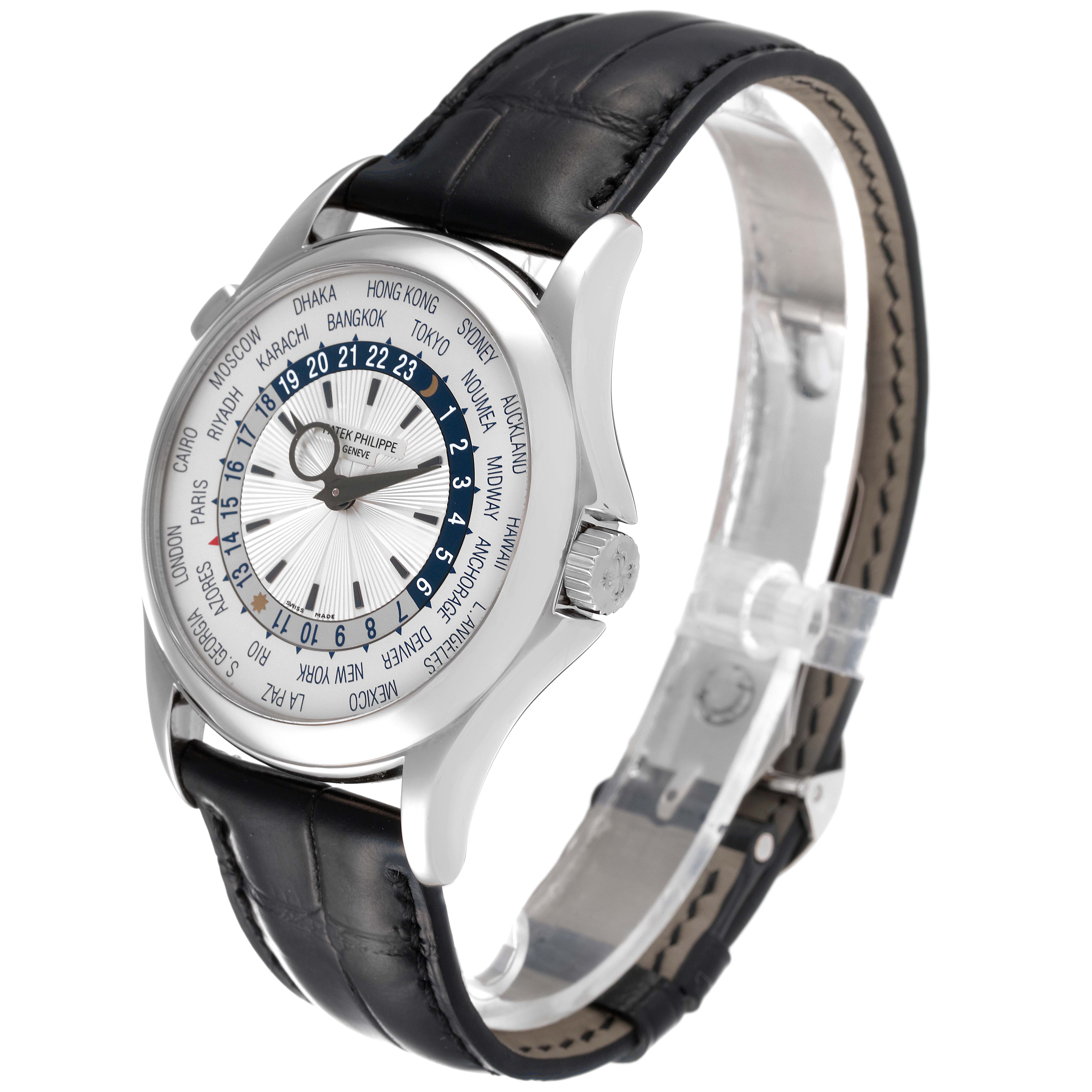 The image shows a side angle of a Patek Philippe Complications 5130G-019 Men's White Gold Silver Dial 5130G-019 Men's White Gold Silver Dial watch, highlighting its dial, bezel, and leather strap.